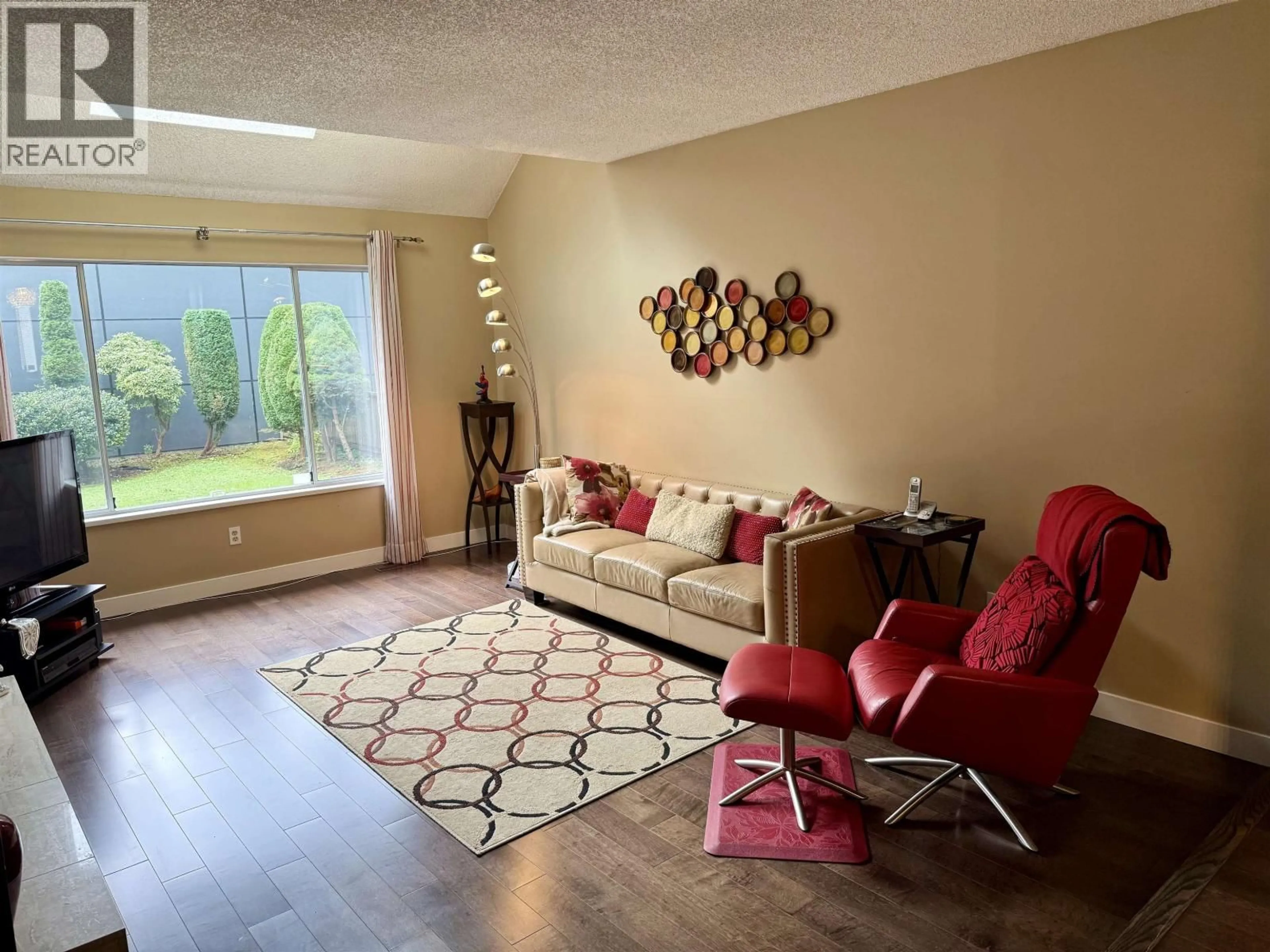 Living room with furniture, unknown for 7217 BRIDLEWOOD COURT, Burnaby British Columbia V5A4A4