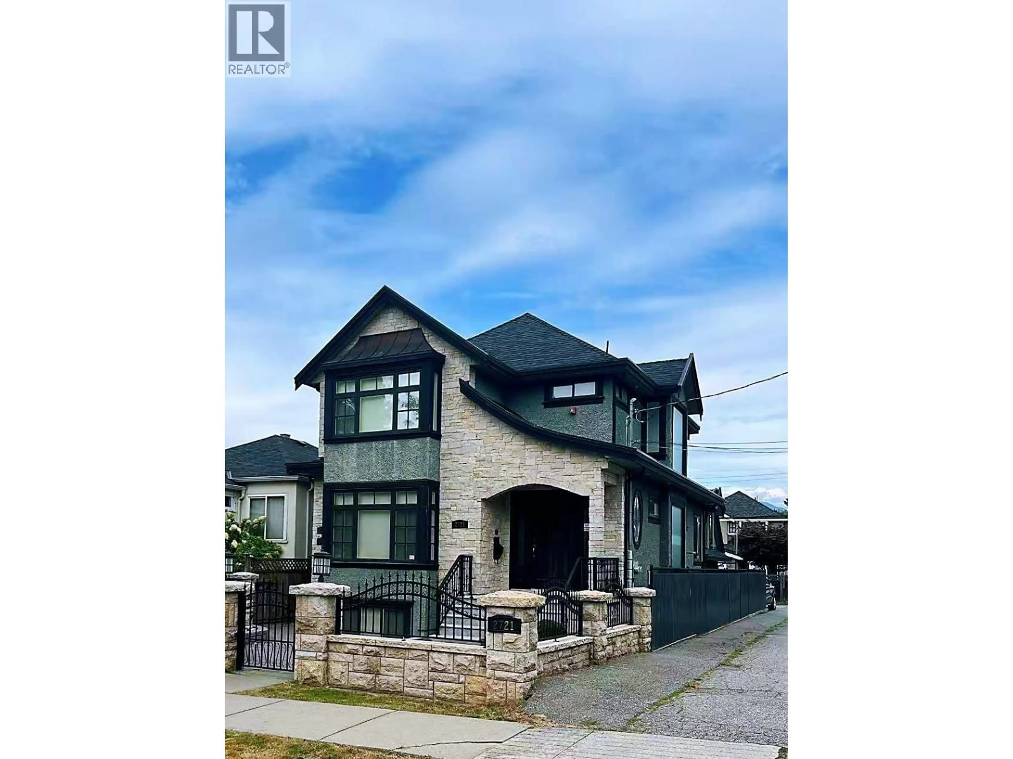 Home with brick exterior material, street for 2721 21 AVENUE, Vancouver British Columbia V6L1K4
