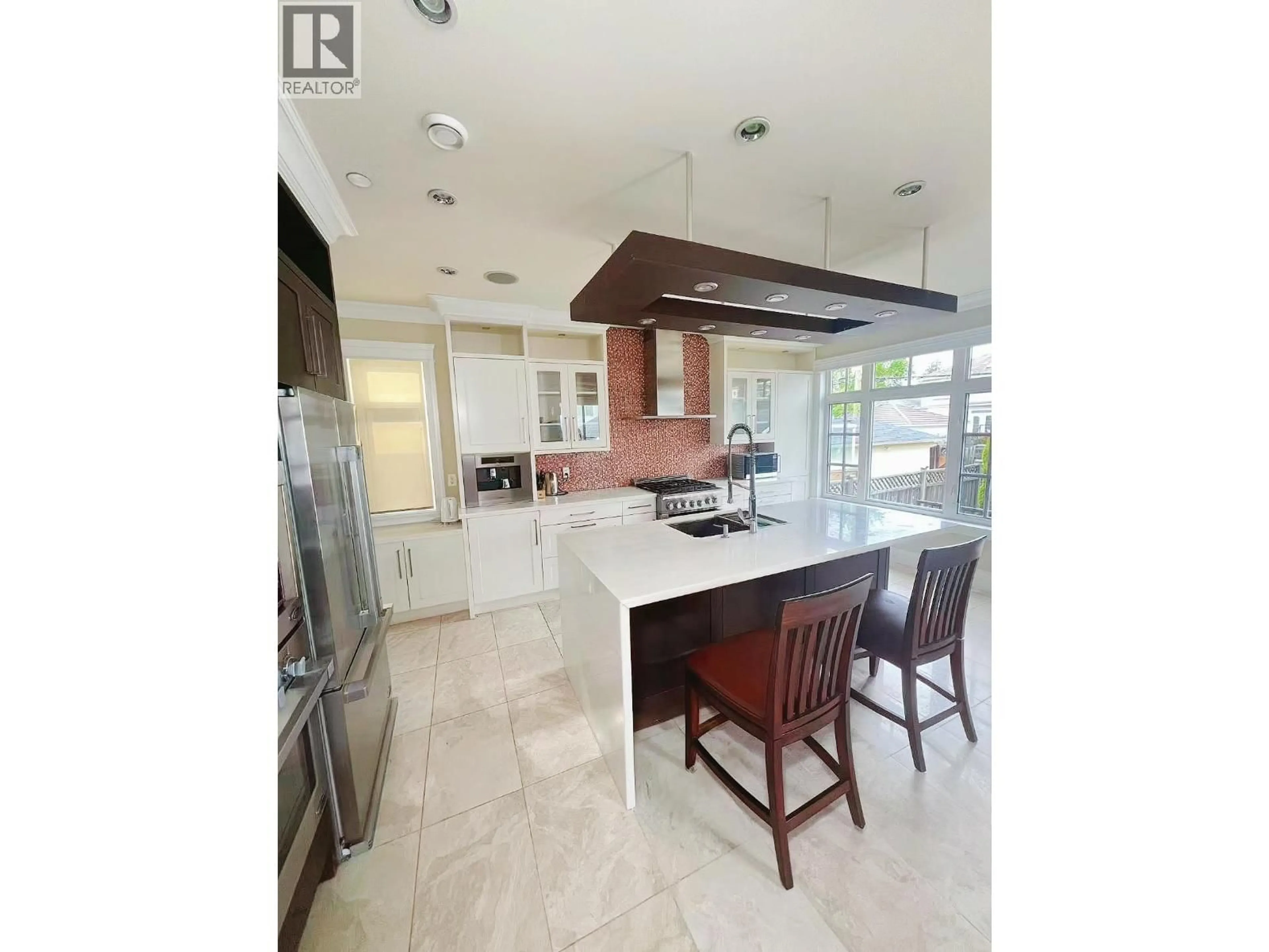 Open concept kitchen, ceramic/tile floor for 2721 21 AVENUE, Vancouver British Columbia V6L1K4