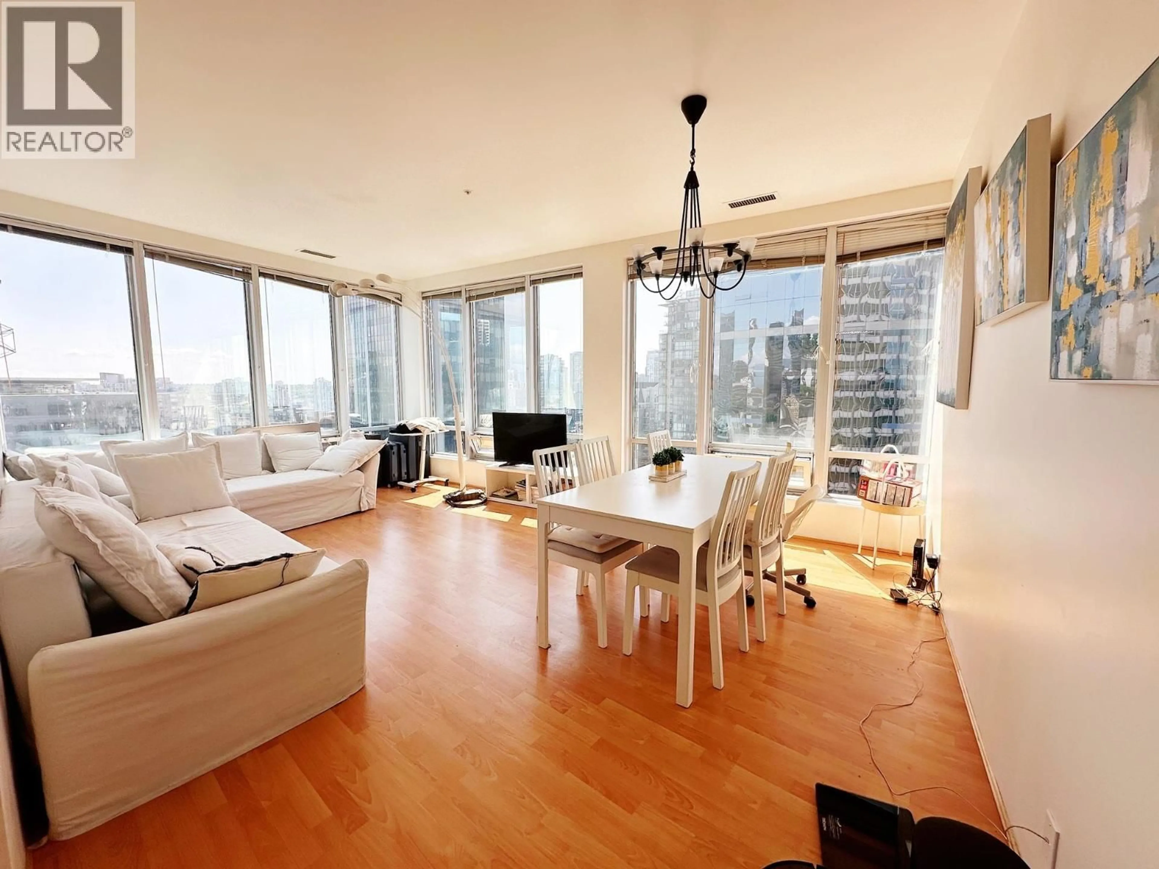 Living room with furniture, wood/laminate floor for 1401 - 989 NELSON STREET, Vancouver British Columbia V6Z2S1