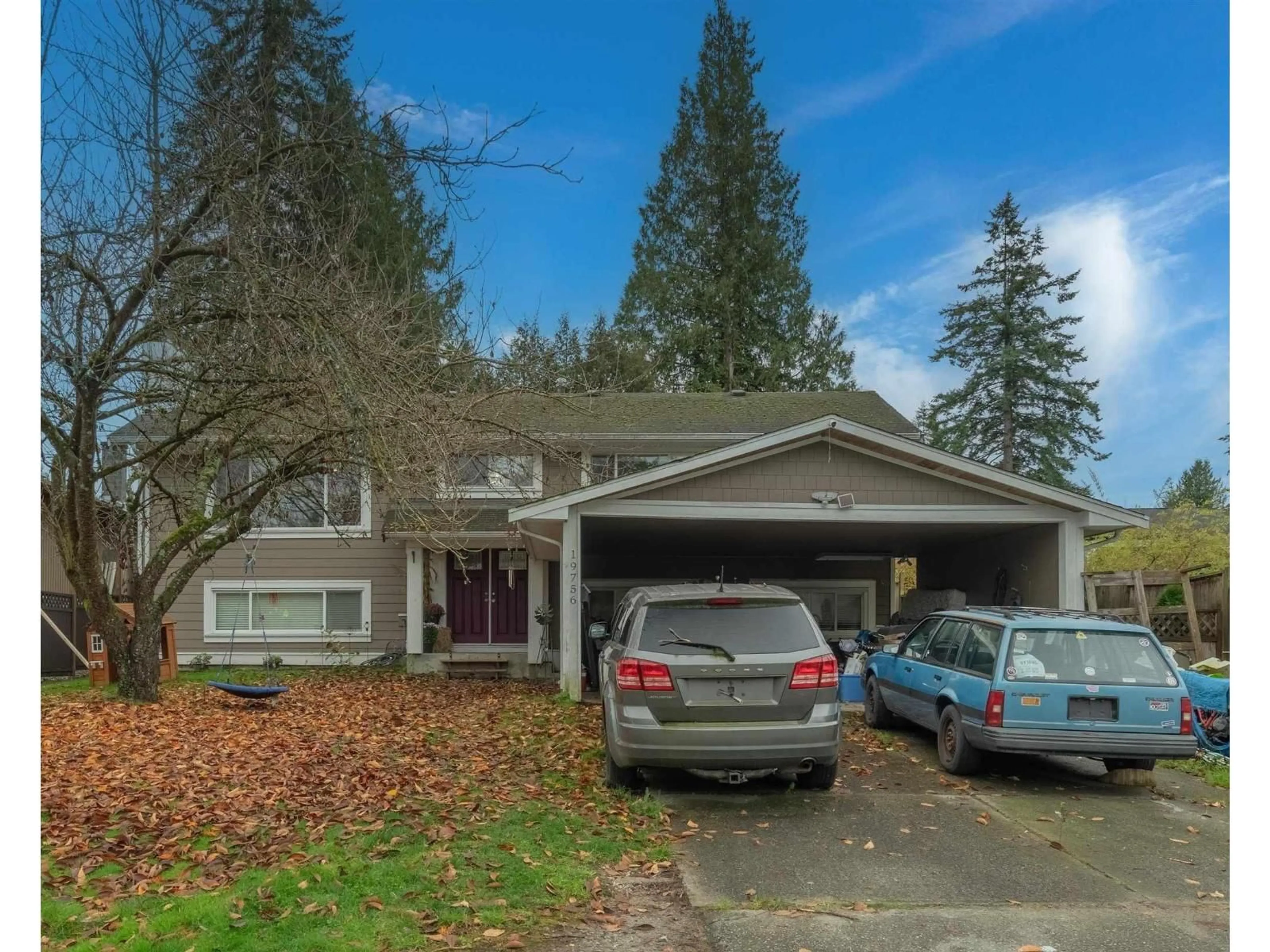 A pic from outside/outdoor area/front of a property/back of a property/a pic from drone, street for 19756 49 AVENUE, Langley British Columbia V3A3R4