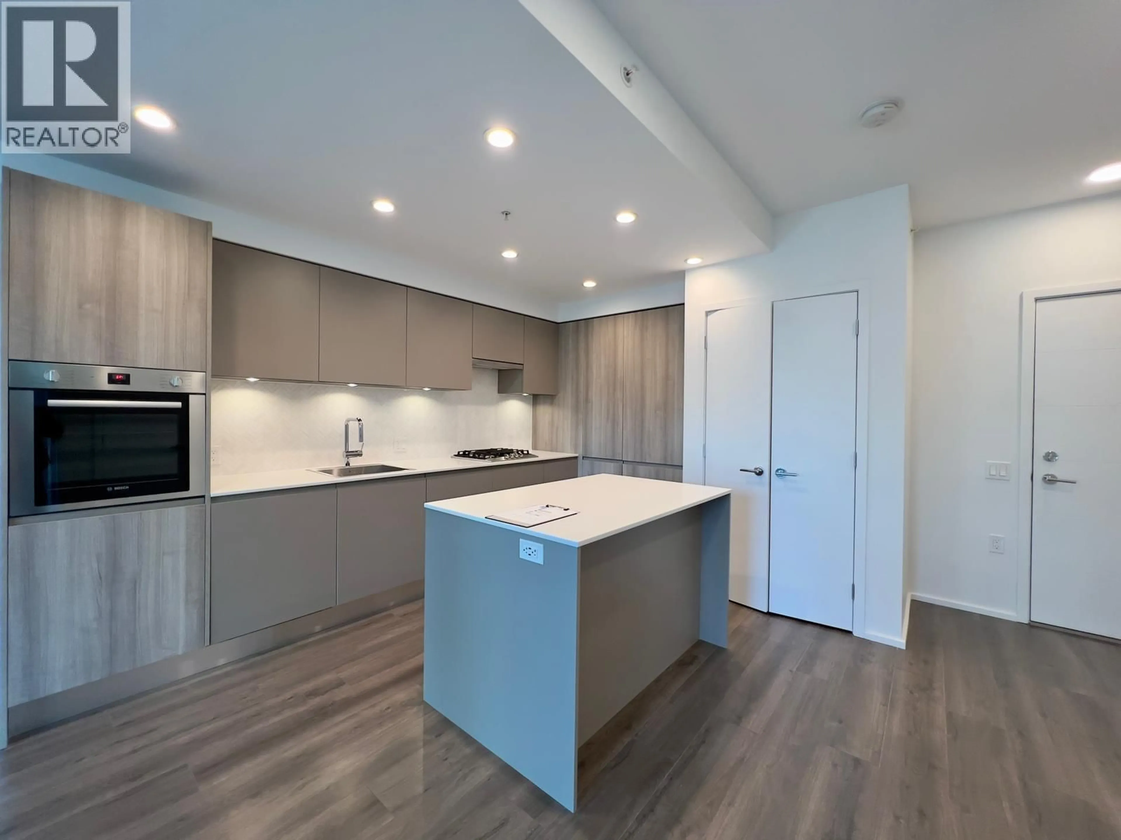 Open concept kitchen, unknown for 304 - 3809 EVERGREEN PLACE, Burnaby British Columbia V3J0M1