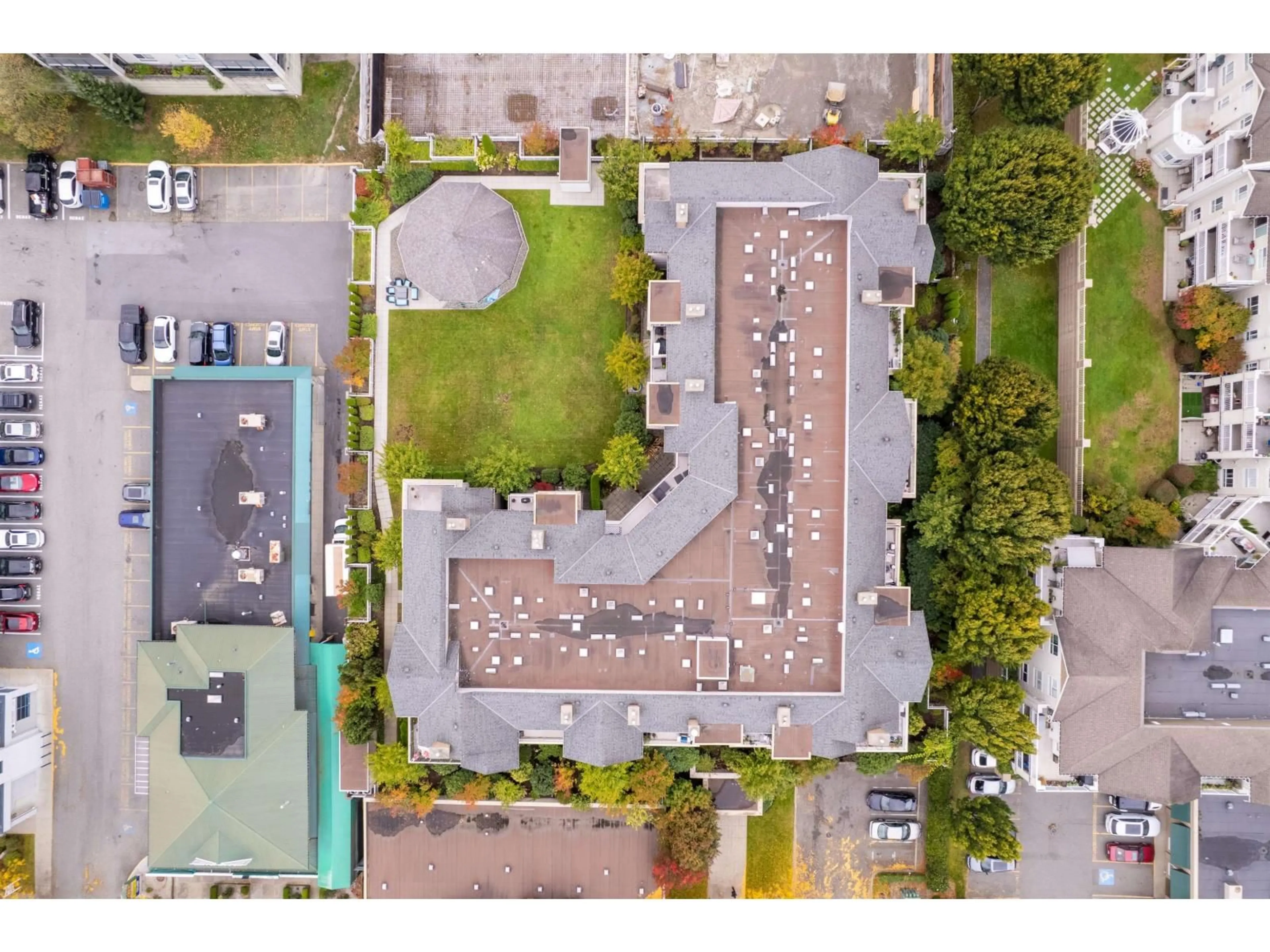 A pic from outside/outdoor area/front of a property/back of a property/a pic from drone, street for 208 - 6359 198, Langley British Columbia V2Y2E3
