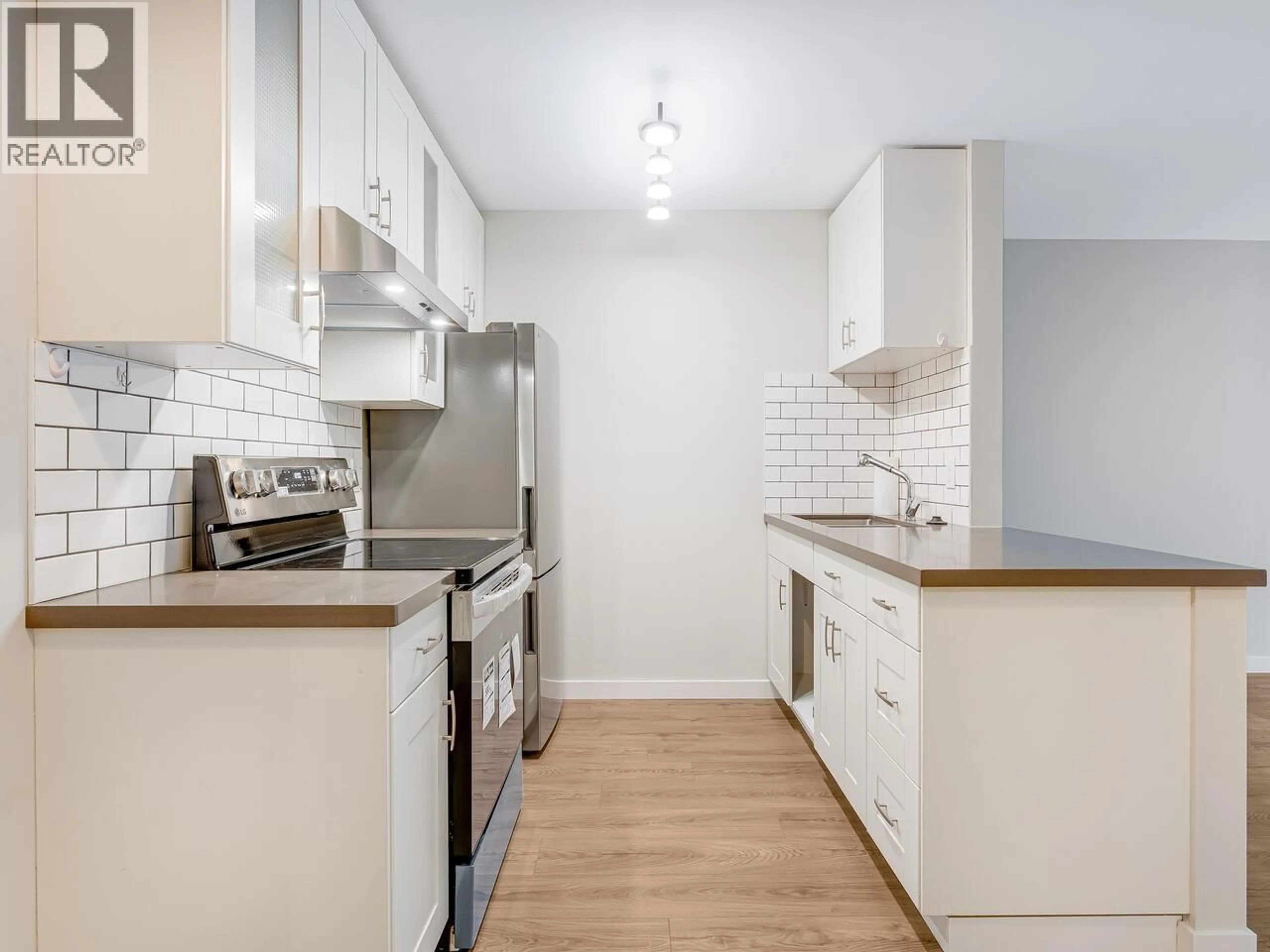 Standard kitchen, wood/laminate floor for 204 - 2234 PRINCE ALBERT STREET, Vancouver British Columbia V5T4K9