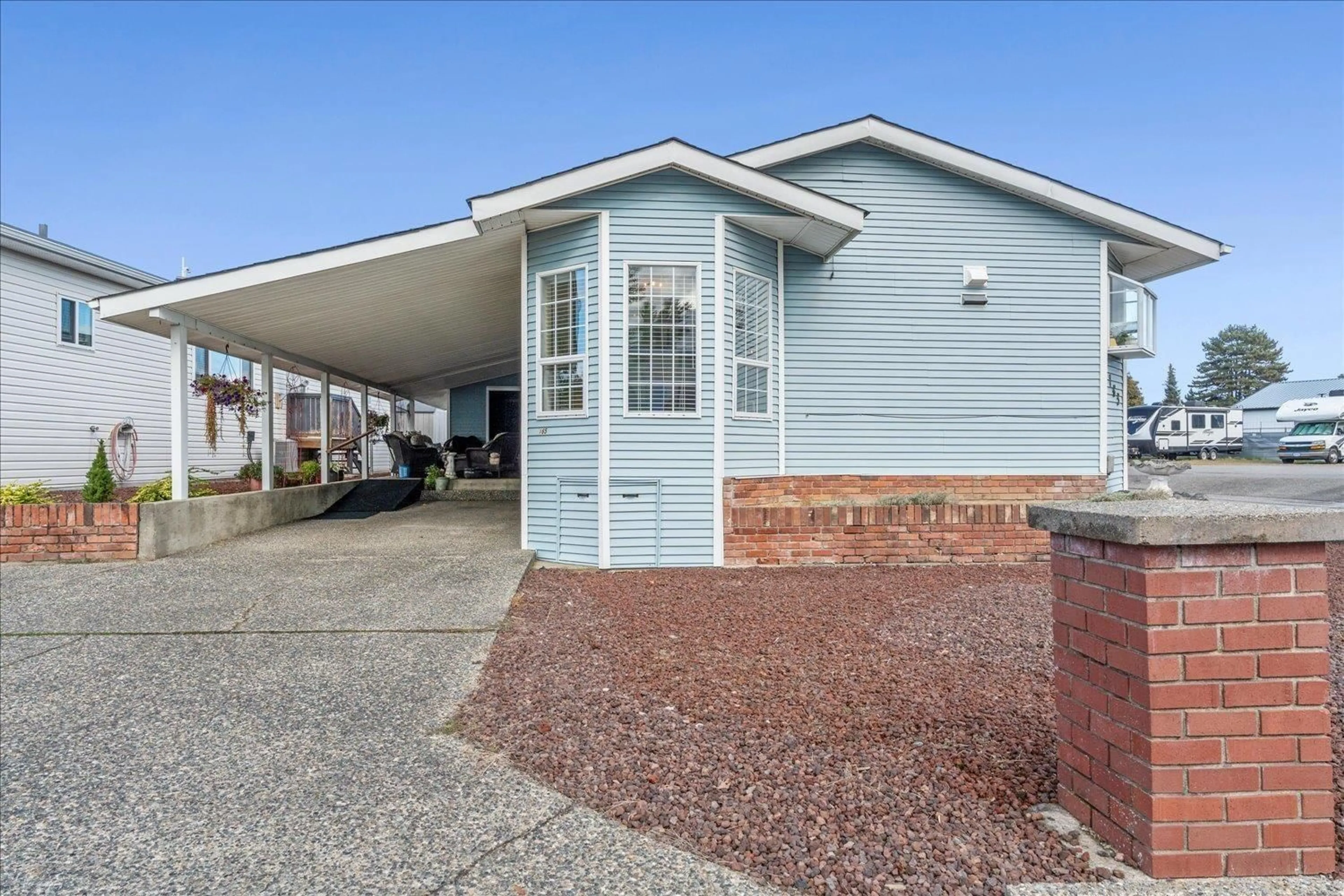Home with vinyl exterior material, street for 165 - 9055 ASHWELL ROAD, Chilliwack British Columbia V2P7S6