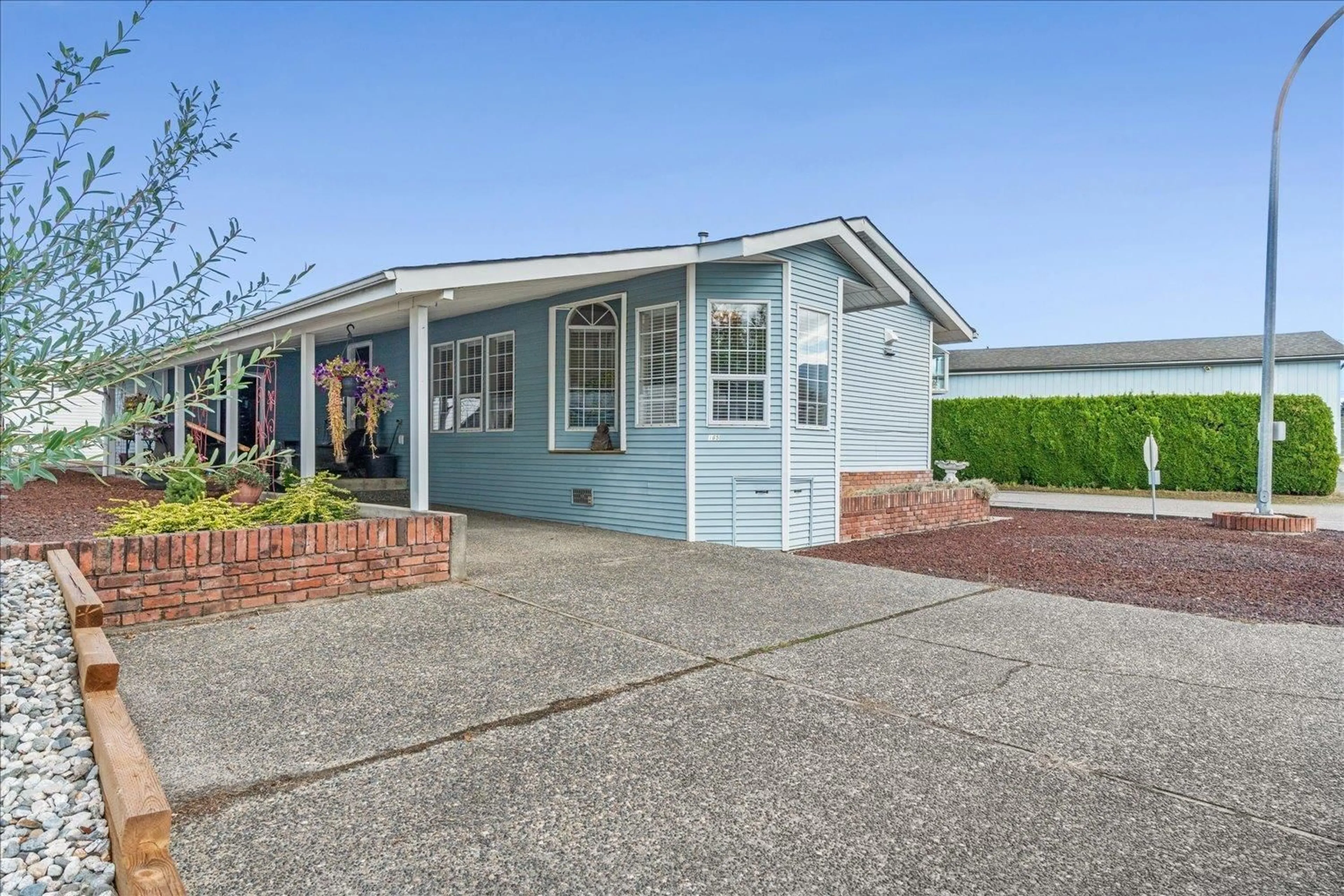 Home with vinyl exterior material, street for 165 - 9055 ASHWELL ROAD, Chilliwack British Columbia V2P7S6