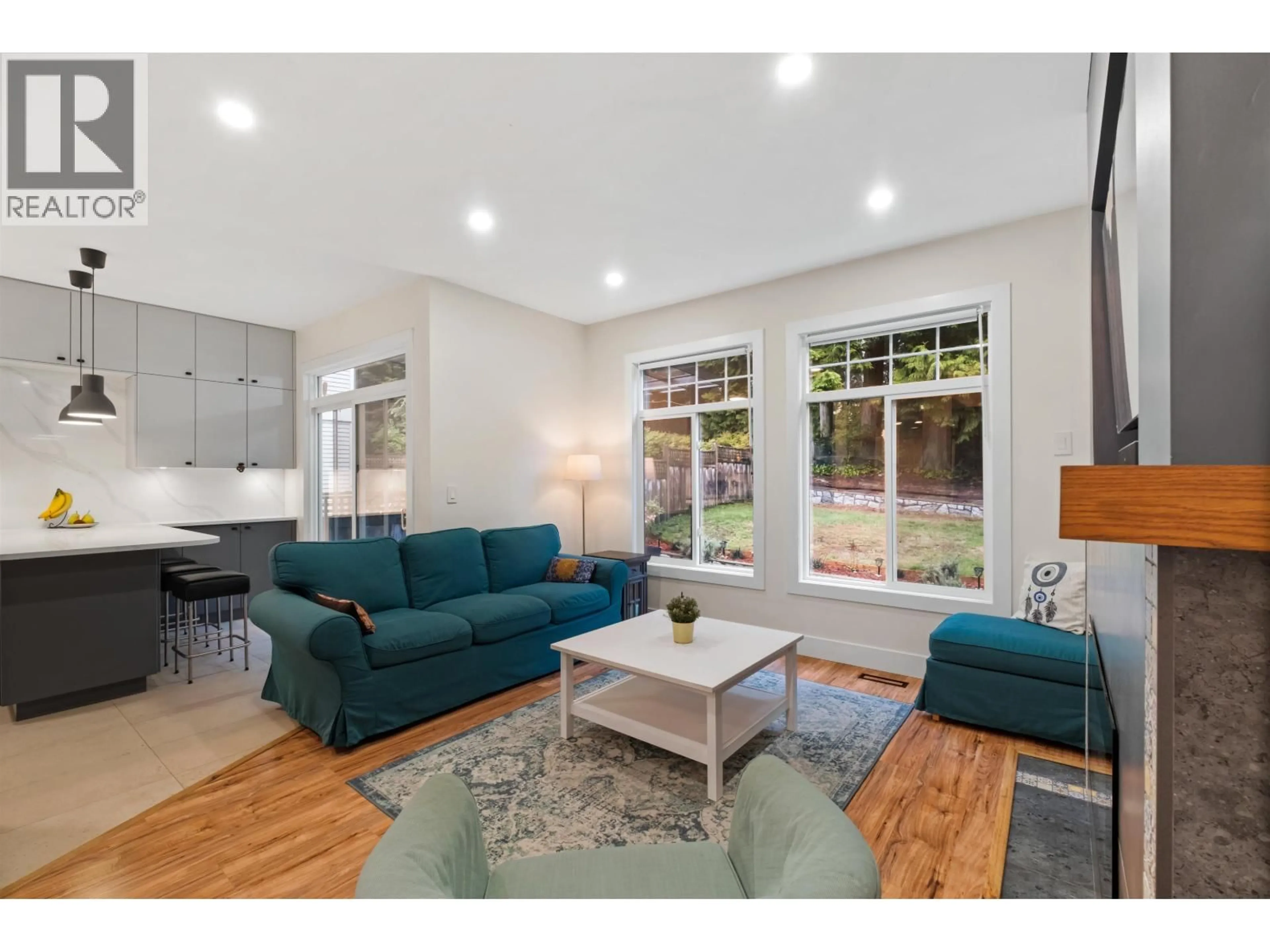 Living room with furniture, wood/laminate floor for 1693 ARBUTUS PLACE, Coquitlam British Columbia V3E3K2