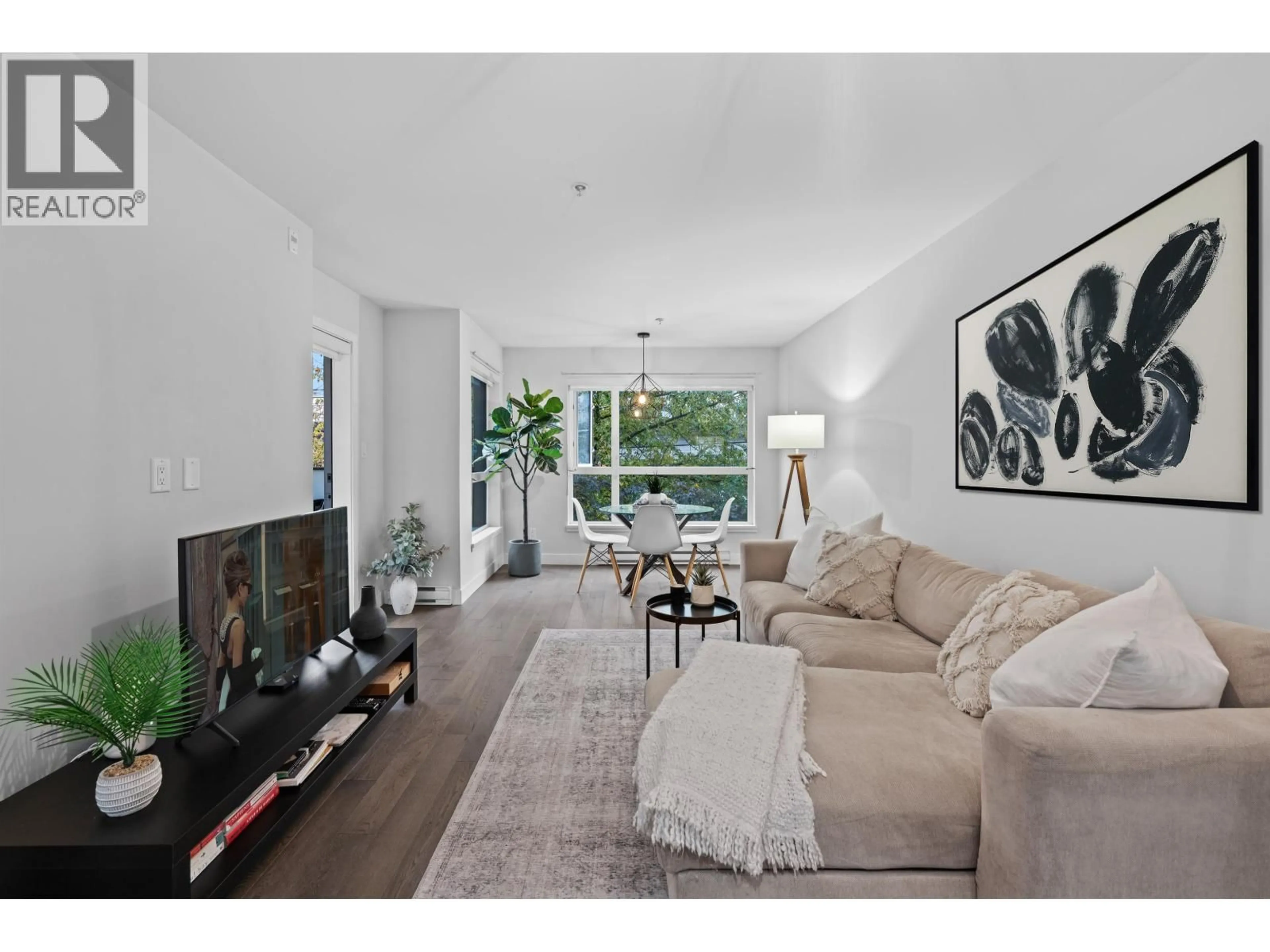 Living room with furniture, unknown for 208 - 3456 COMMERCIAL STREET, Vancouver British Columbia V5N4E9