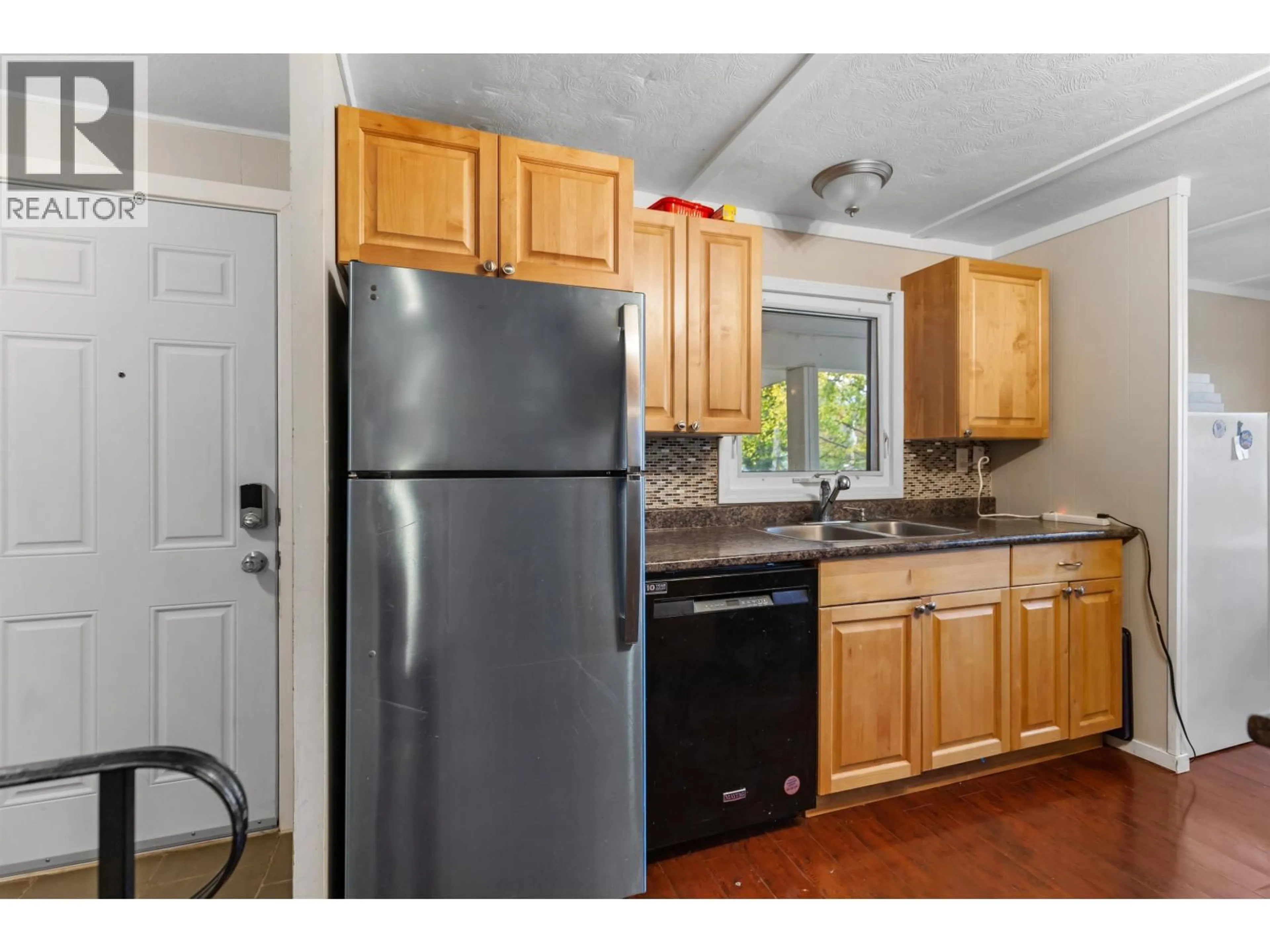 Standard kitchen, wood/laminate floor for 2274 BALL PLACE, Prince George British Columbia V2K3C6