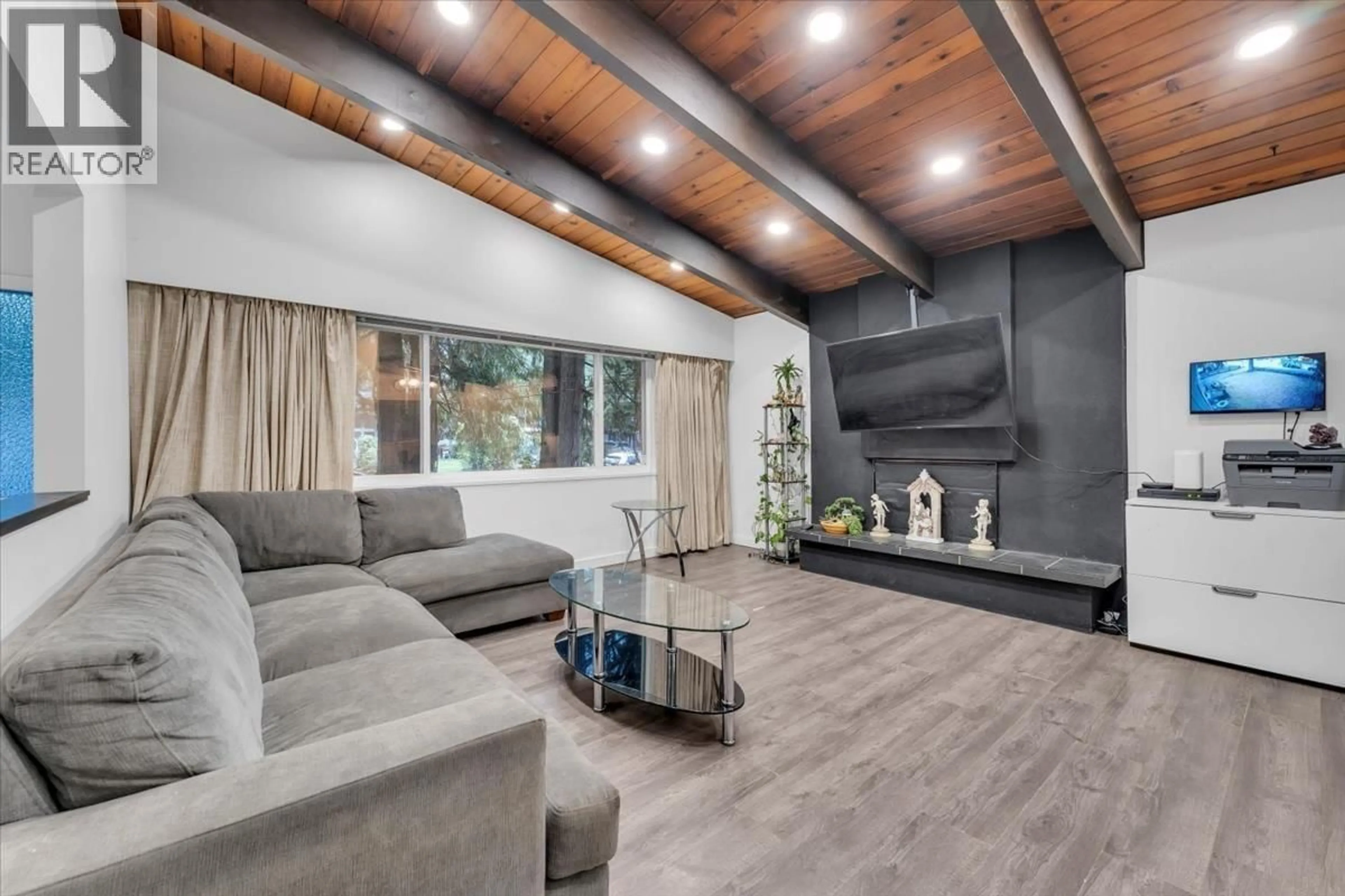 Living room with furniture, wood/laminate floor for 1707 DEMPSEY ROAD, North Vancouver British Columbia V7K1T2