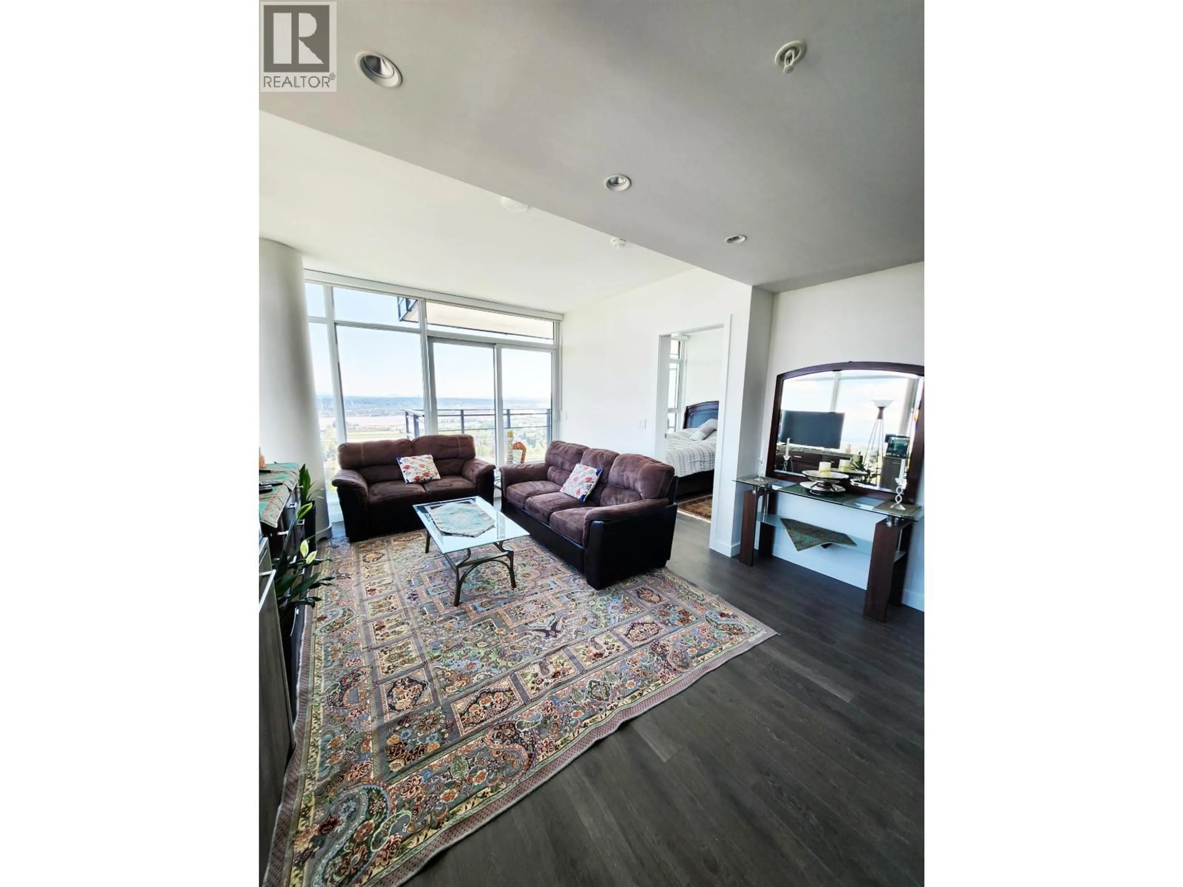 Living room with furniture, wood/laminate floor for 2102 - 505 NELSON STREET, Coquitlam British Columbia V3J0R5