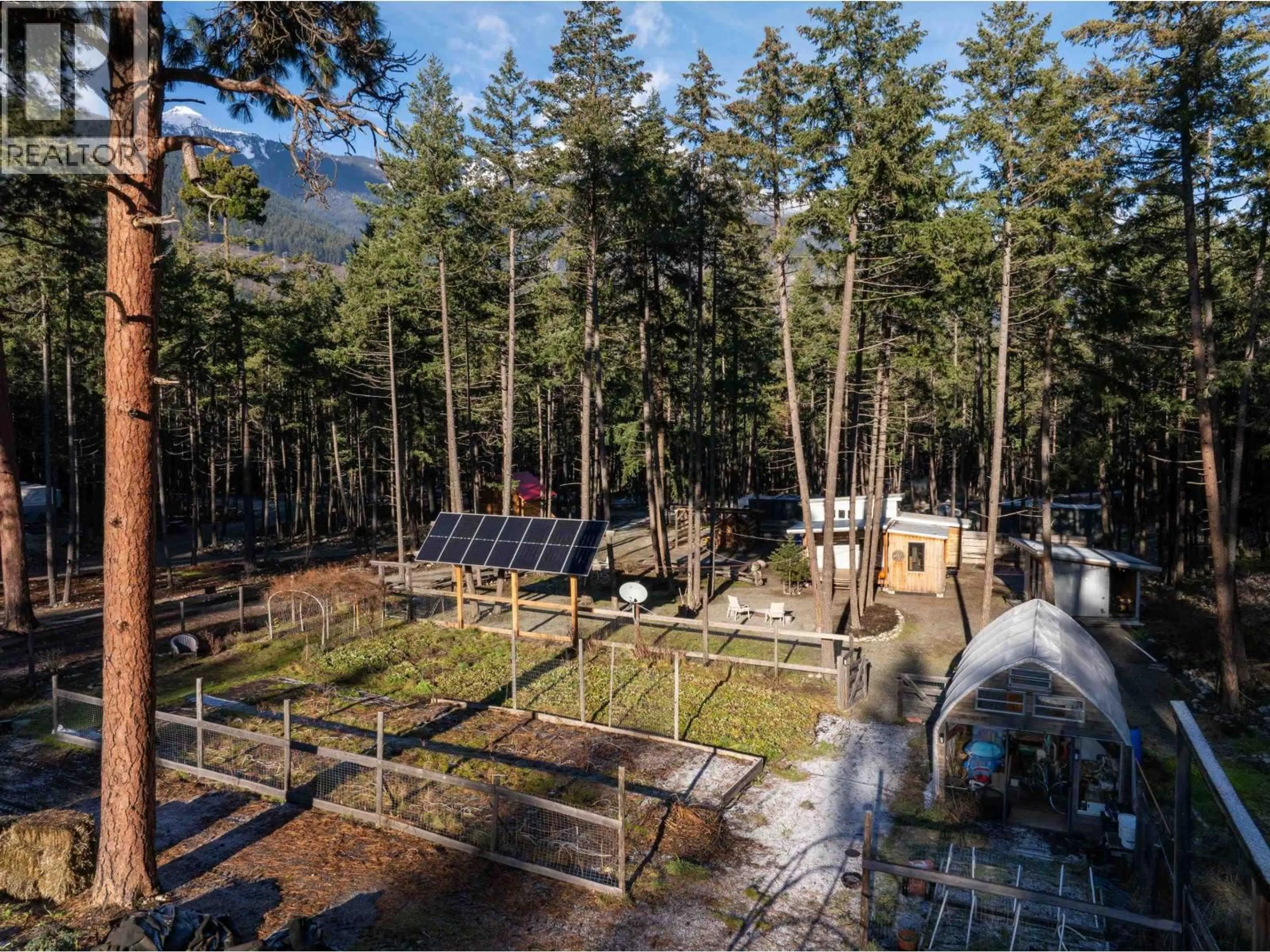 A pic from outside/outdoor area/front of a property/back of a property/a pic from drone, forest/trees view for 6 - 9866 PEMBERTON PORTAGE ROAD, D'Arcy British Columbia V0N1L0