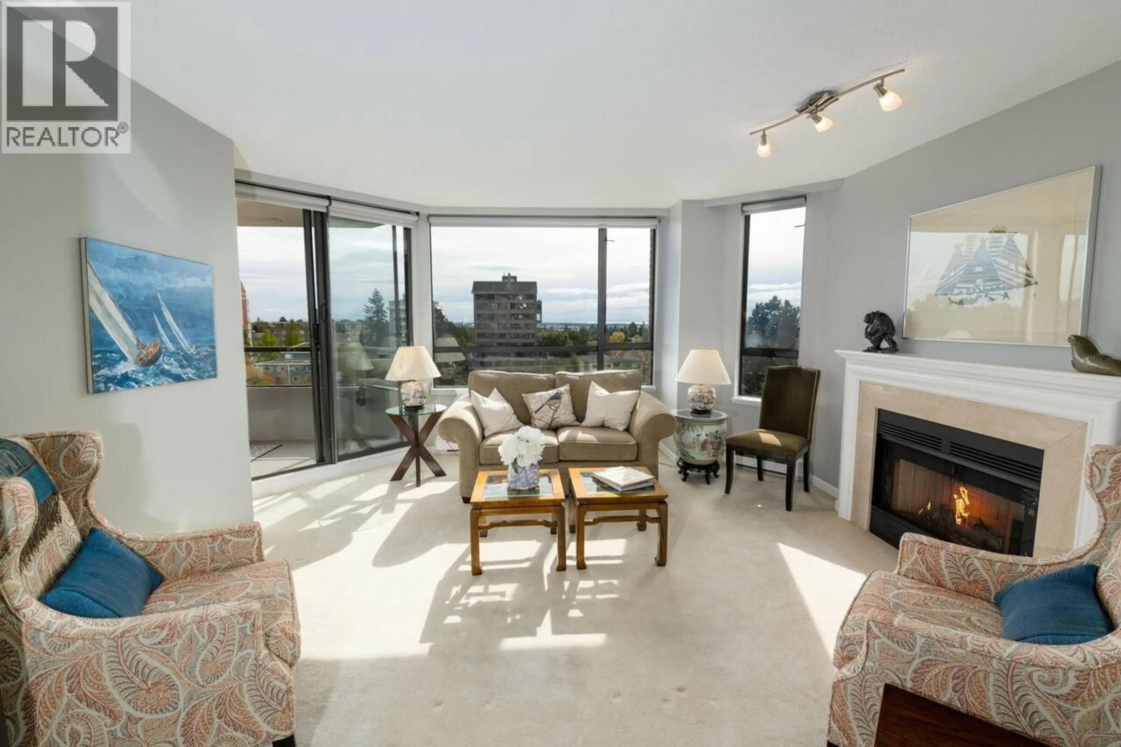 Living room with furniture, unknown for 703 - 2189 42 AVENUE, Vancouver British Columbia V6M2B7