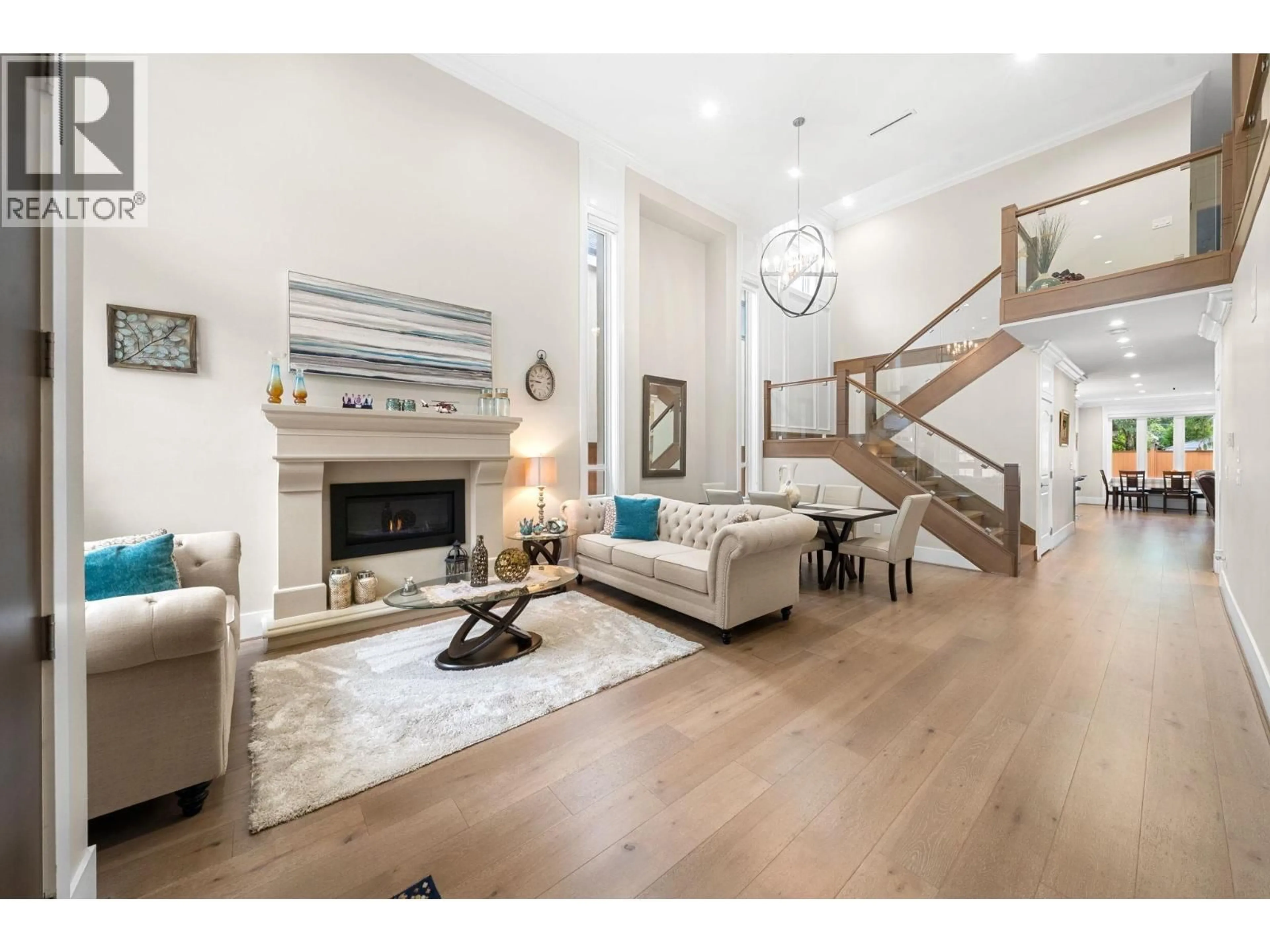 Living room with furniture, wood/laminate floor for 10340 BIRD ROAD, Richmond British Columbia V6X1N6