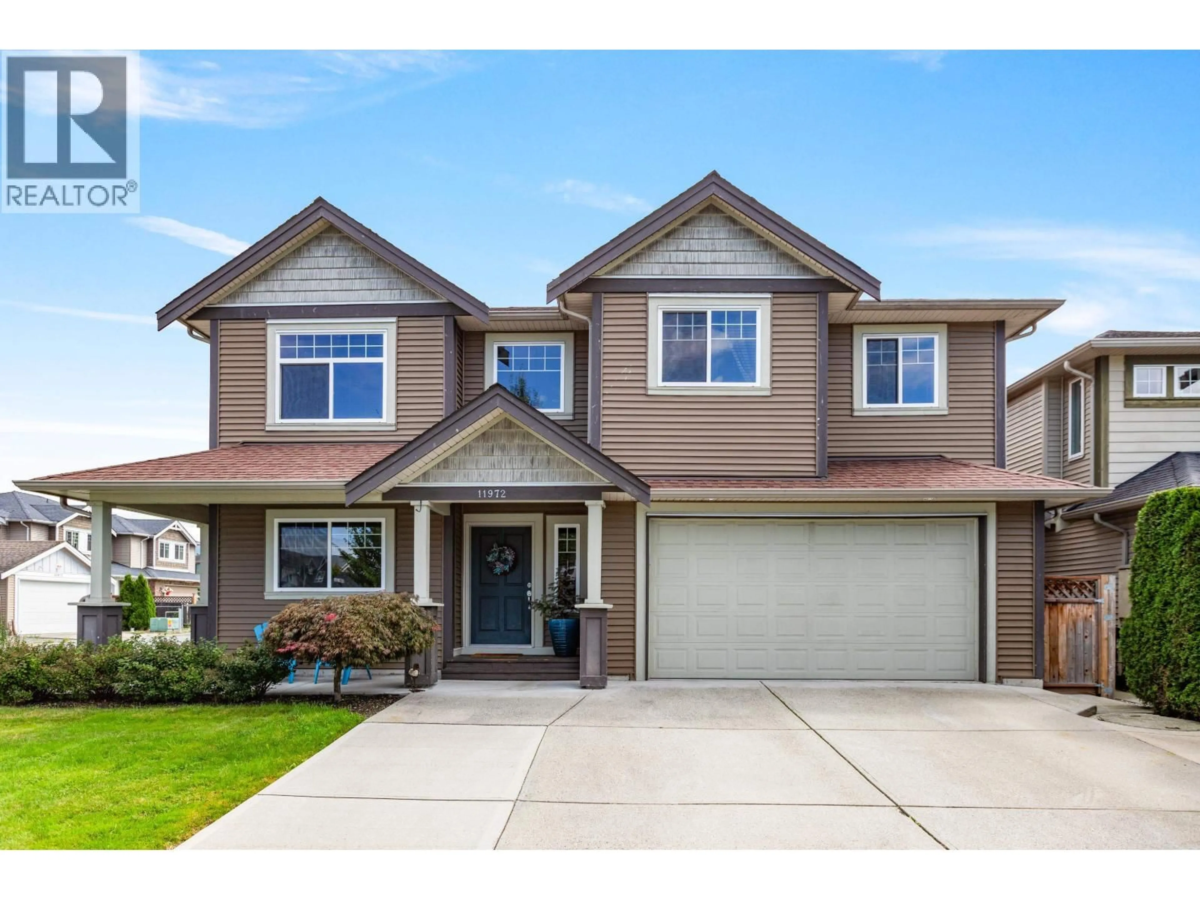 Home with vinyl exterior material, street for 11972 239 STREET, Maple Ridge British Columbia V4R1W4