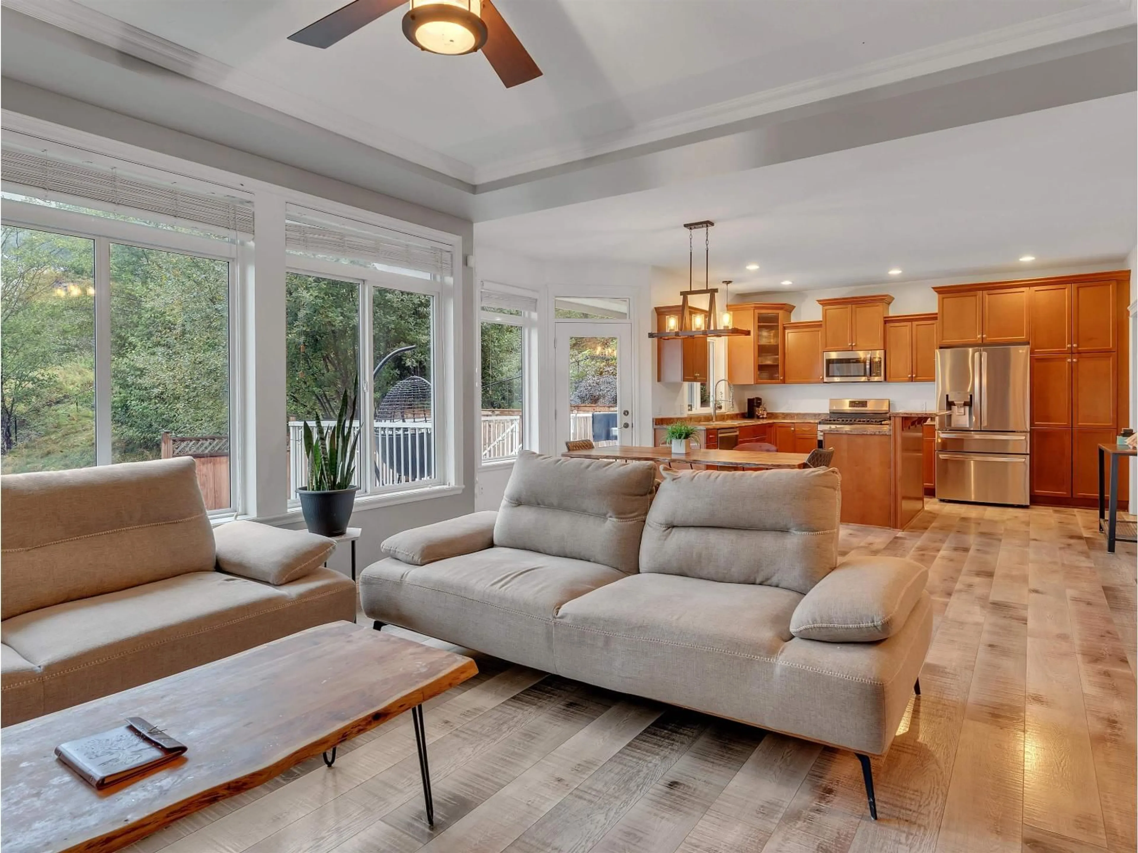 Living room with furniture, wood/laminate floor for 5566 THOM CREEK DRIVE, Chilliwack British Columbia V2R5Z6