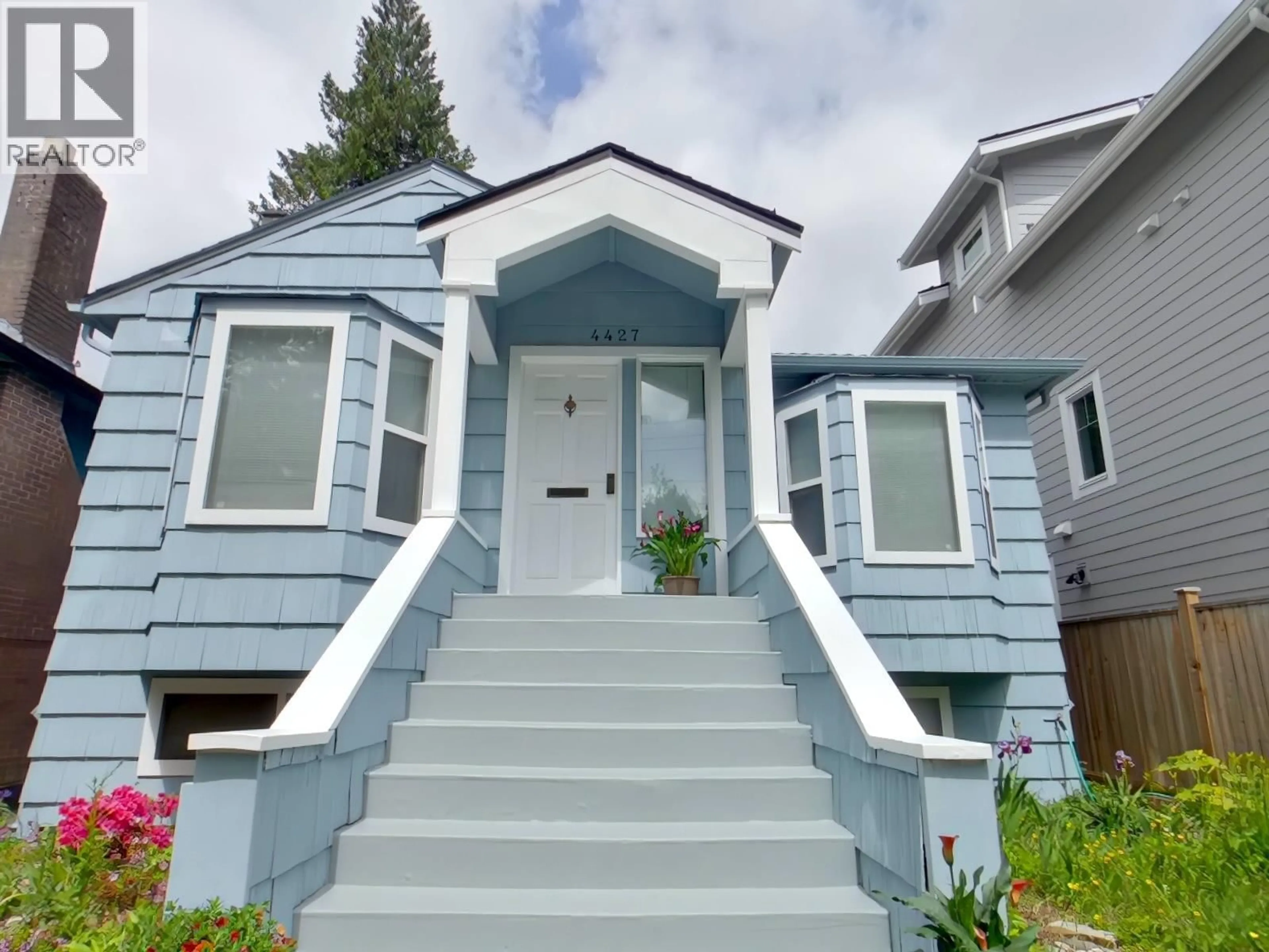Home with vinyl exterior material, street for 4427 16TH AVENUE, Vancouver British Columbia V6R3E7