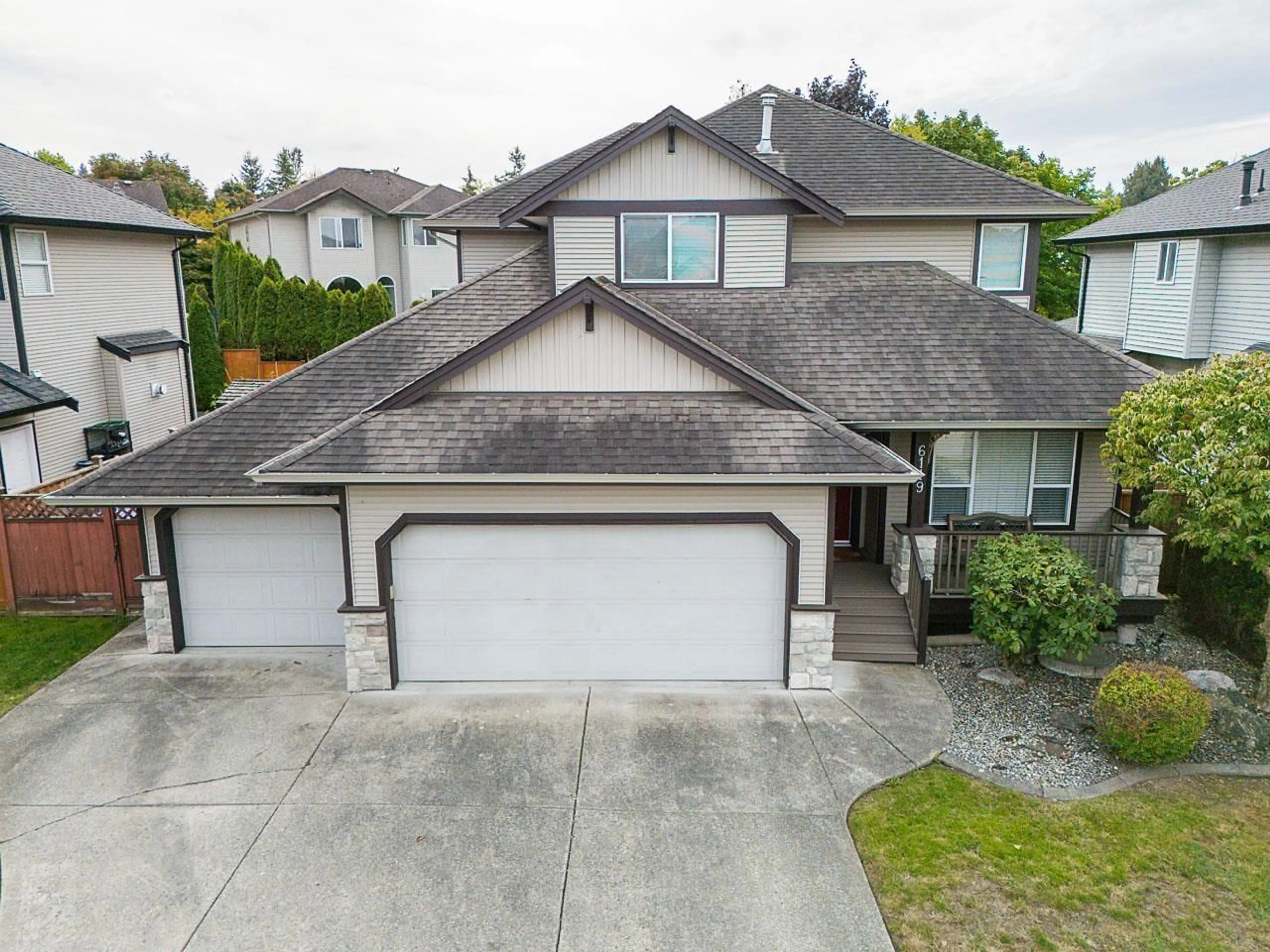 A pic from outside/outdoor area/front of a property/back of a property/a pic from drone, street for 6119 166A, Surrey British Columbia V3S9L2