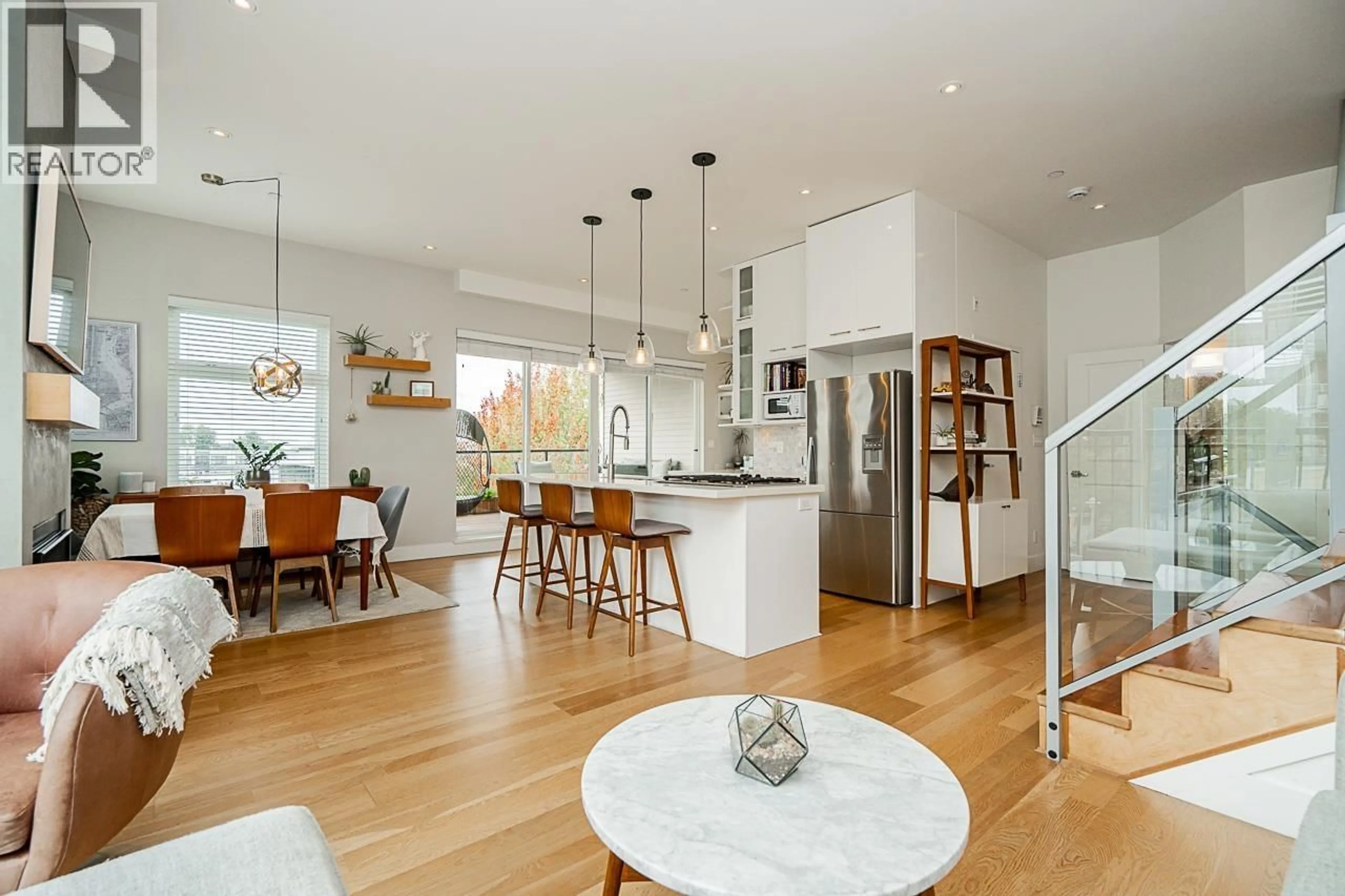 Open concept kitchen, wood/laminate floor for 6 - 3993 CHATHAM STREET, Richmond British Columbia V7E2Z6