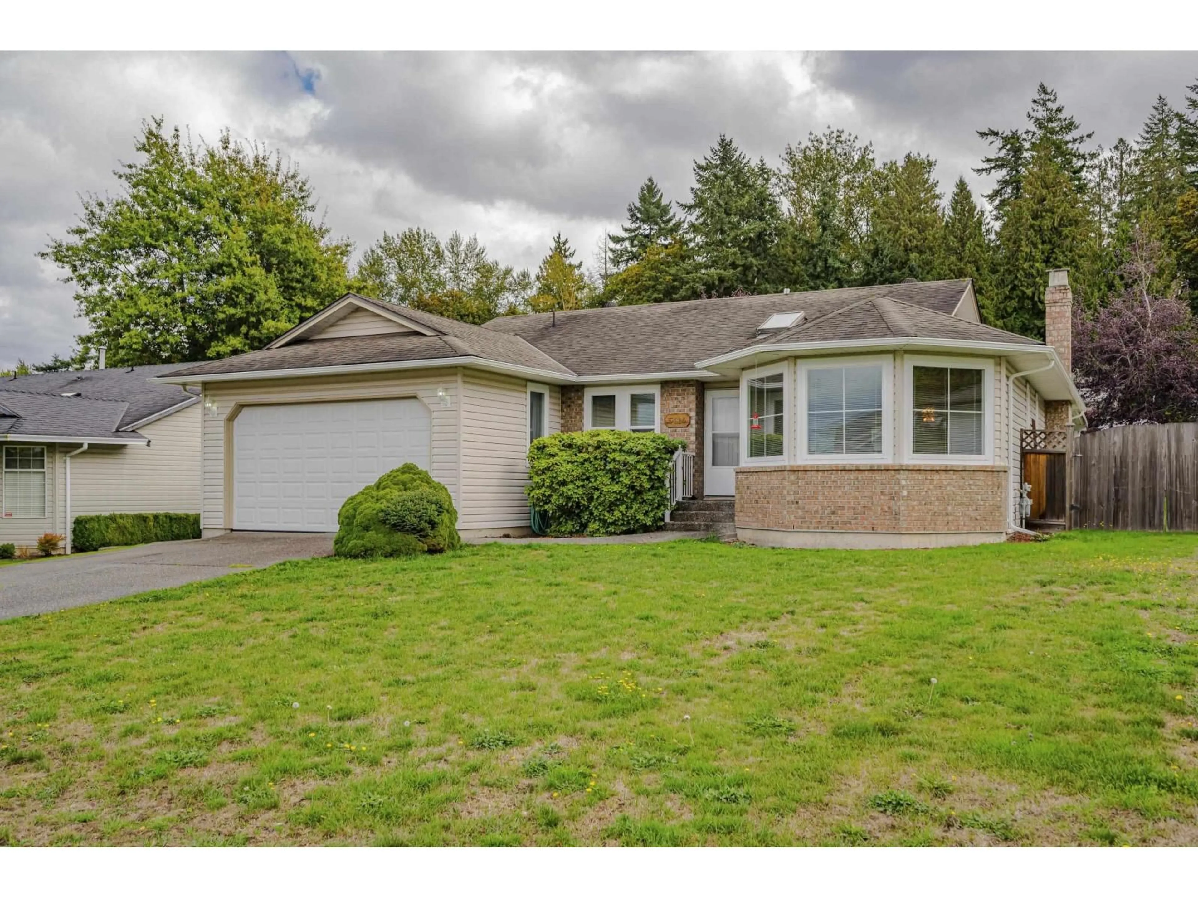 Home with vinyl exterior material, street for 5114 219, Langley British Columbia V3A8P7