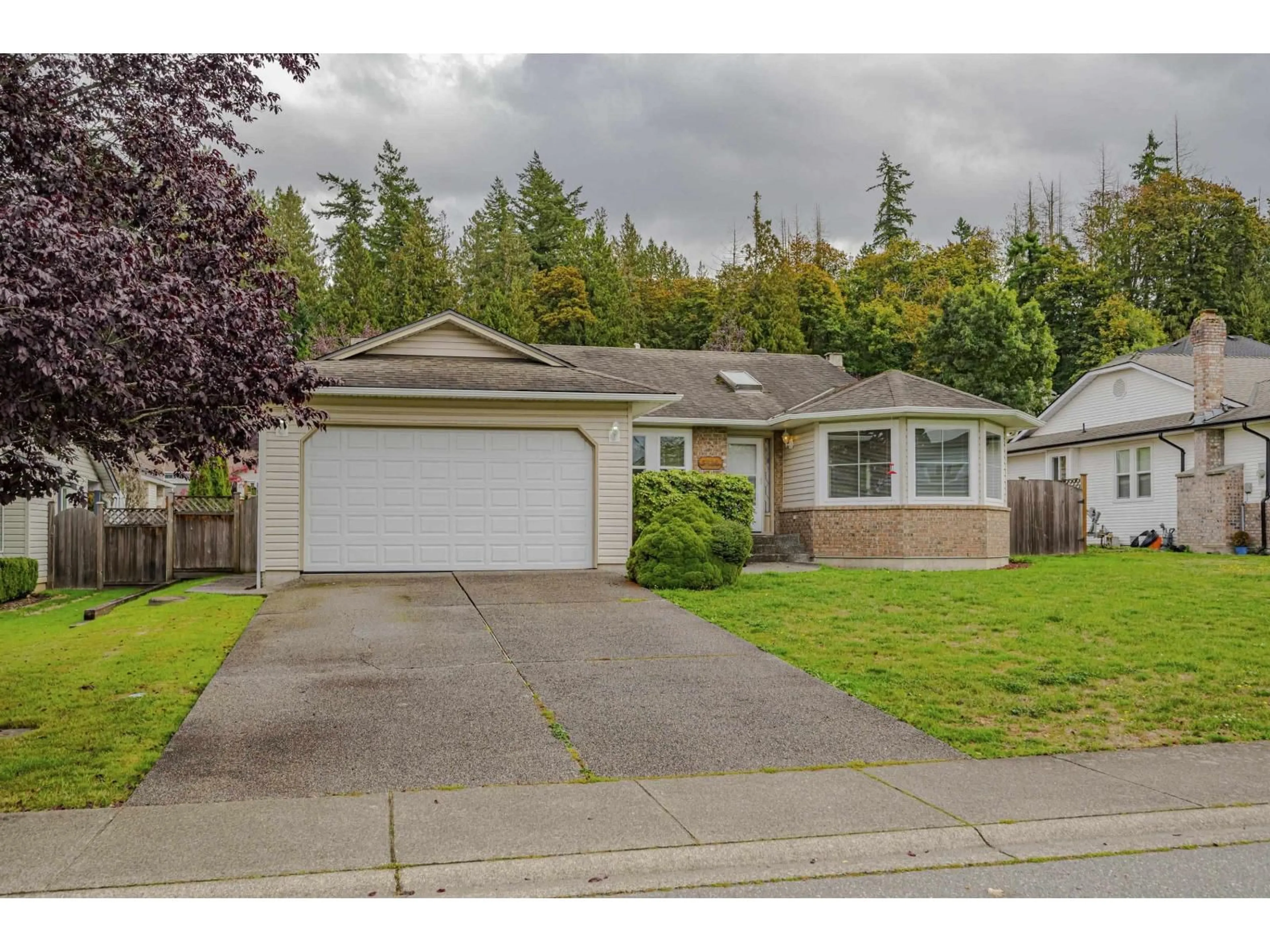 Home with vinyl exterior material, street for 5114 219, Langley British Columbia V3A8P7