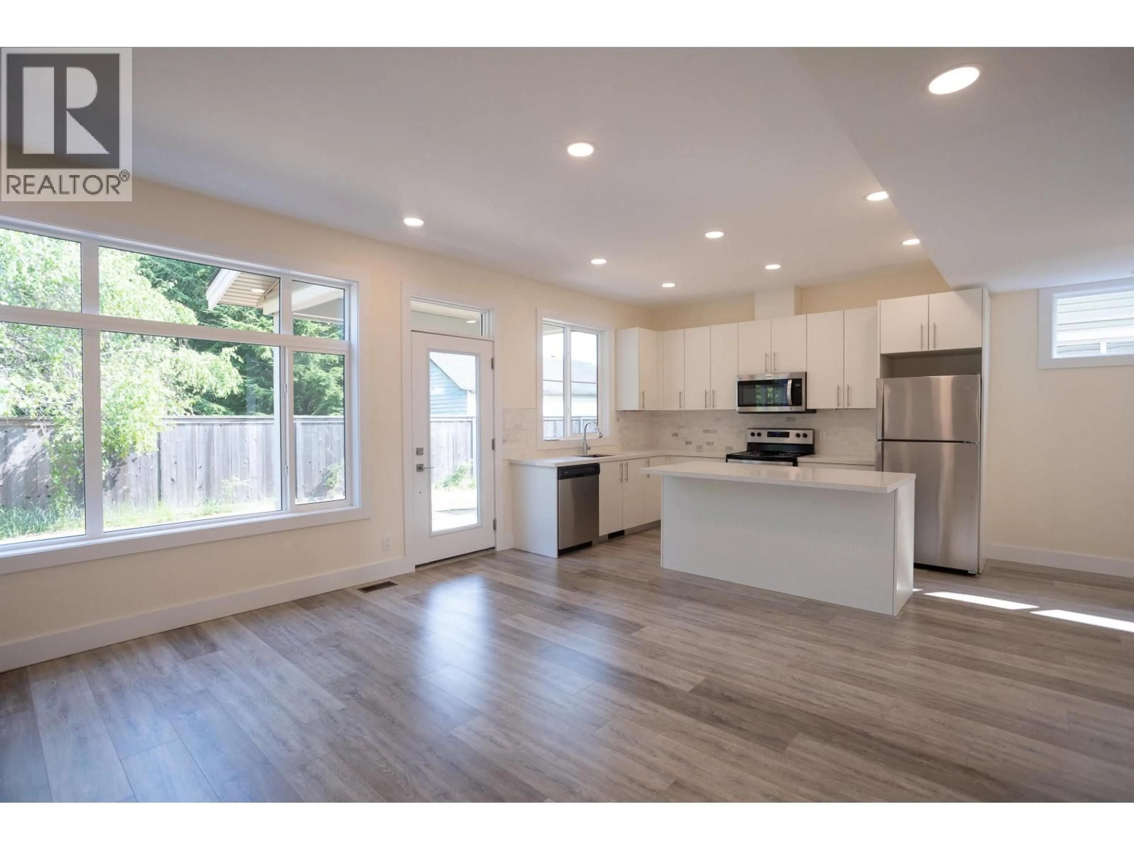 Open concept kitchen, wood/laminate floor for 23 - 3701 CORY DRIVE, Terrace British Columbia V8G0J6