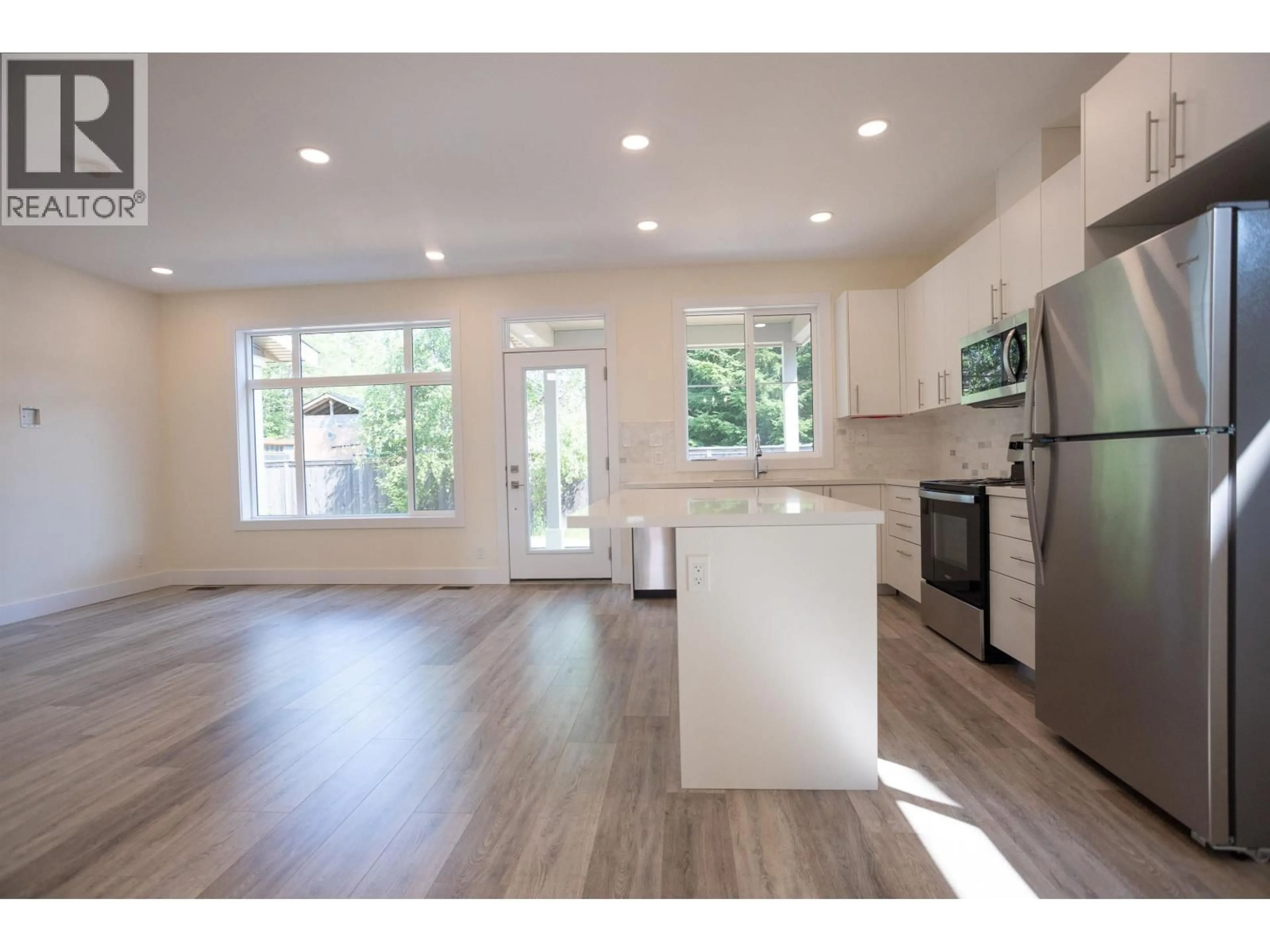 Open concept kitchen, wood/laminate floor for 23 - 3701 CORY DRIVE, Terrace British Columbia V8G0J6
