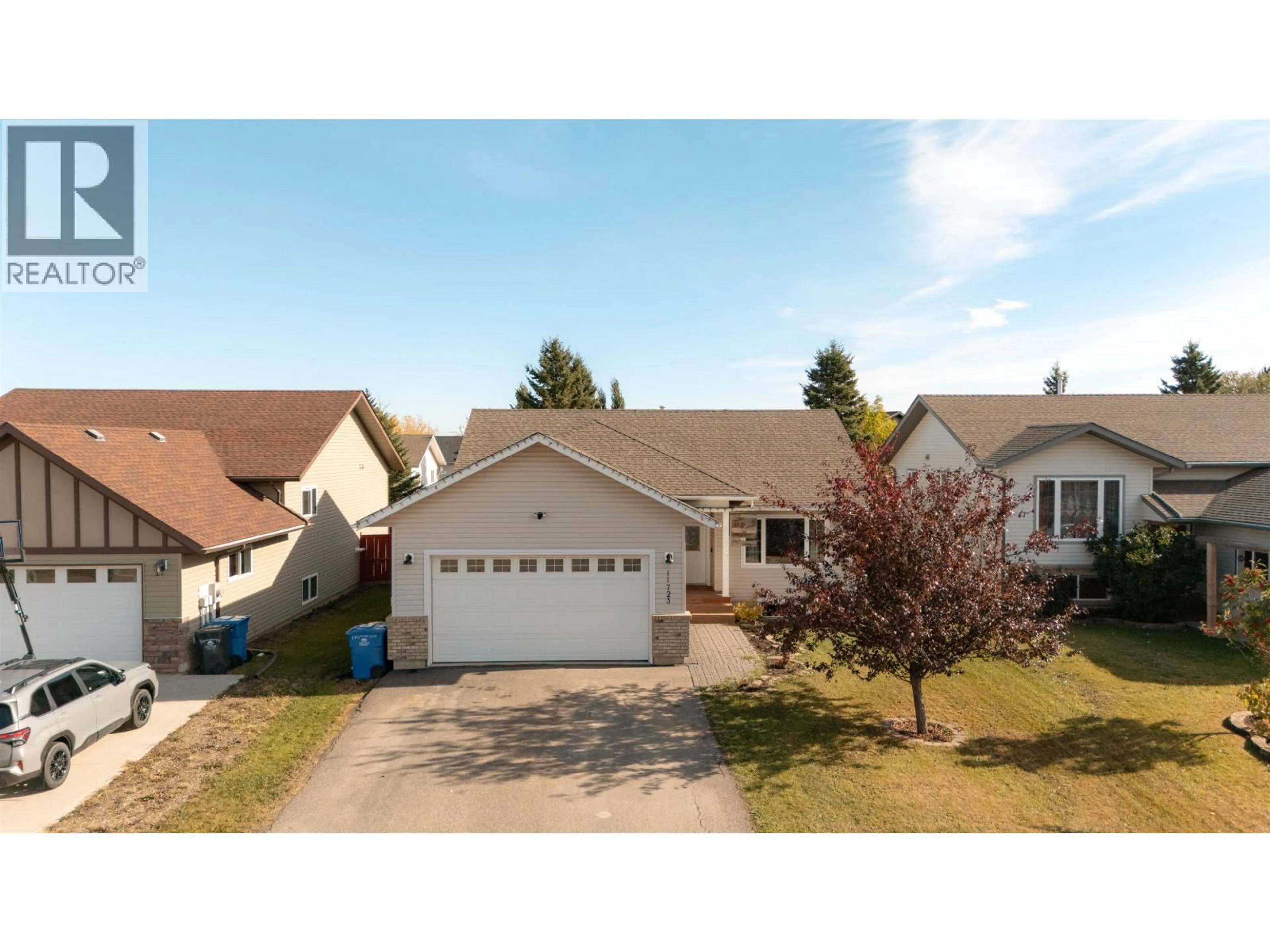 Home with vinyl exterior material, street for 11723 91 STREET, Fort St. John British Columbia V1J0B3