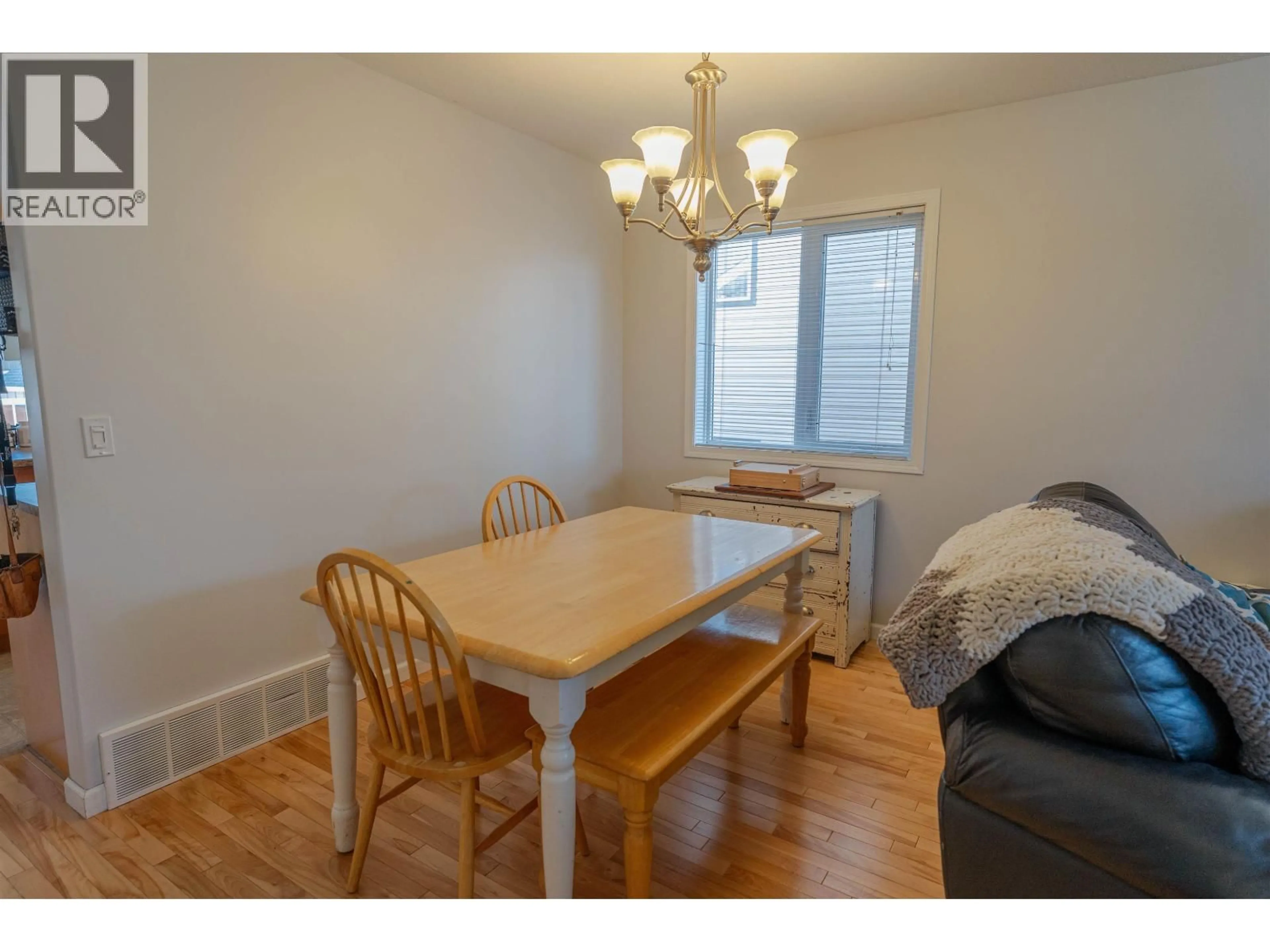 Dining room, wood/laminate floor for 11723 91 STREET, Fort St. John British Columbia V1J0B3