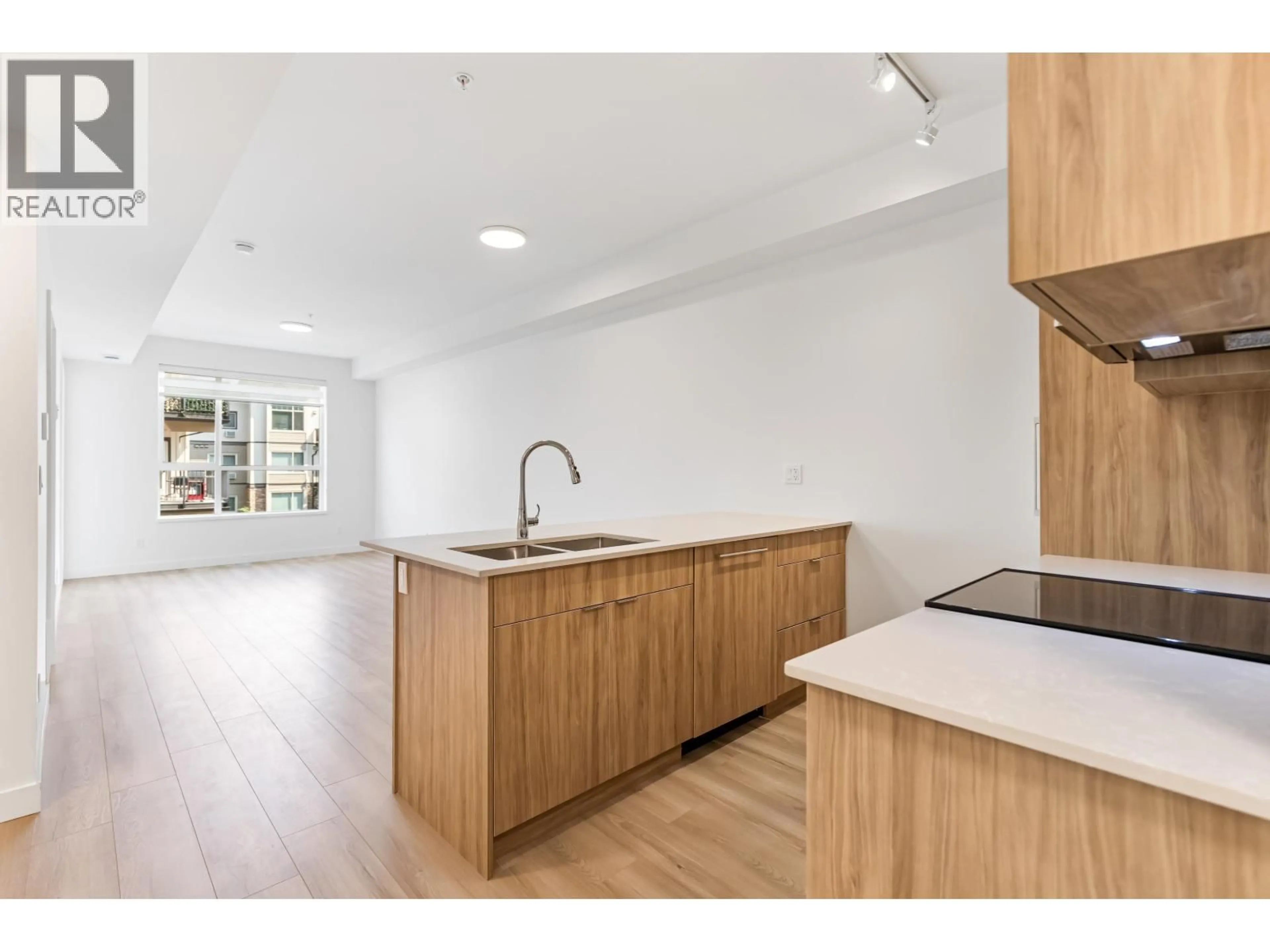 Open concept kitchen, wood/laminate floor for 309 - 11913 BURNETT STREET, Maple Ridge British Columbia V2X4N1