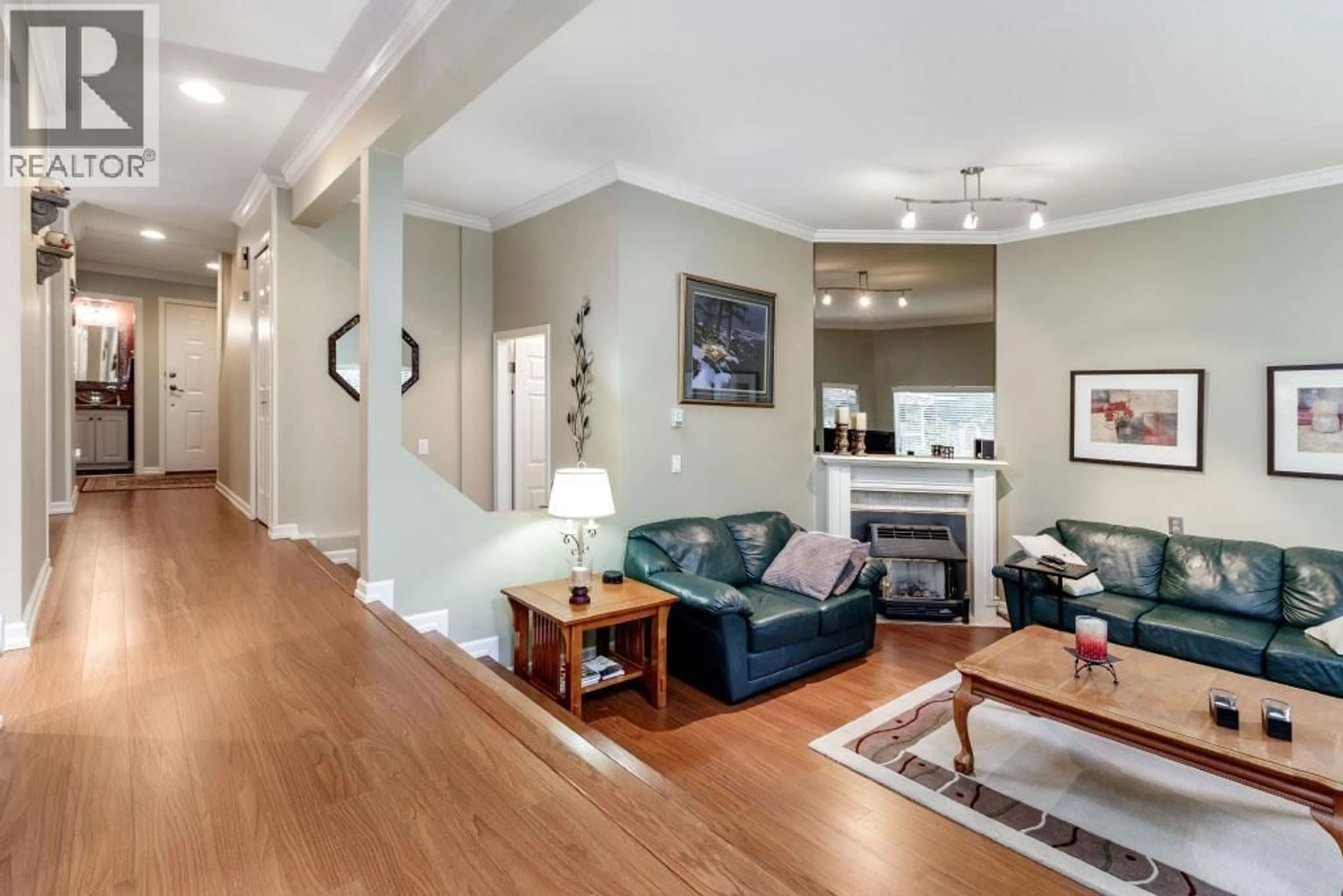 Living room with furniture, unknown for 6 - 1135 LANSDOWNE DRIVE, Coquitlam British Columbia V3B7K6