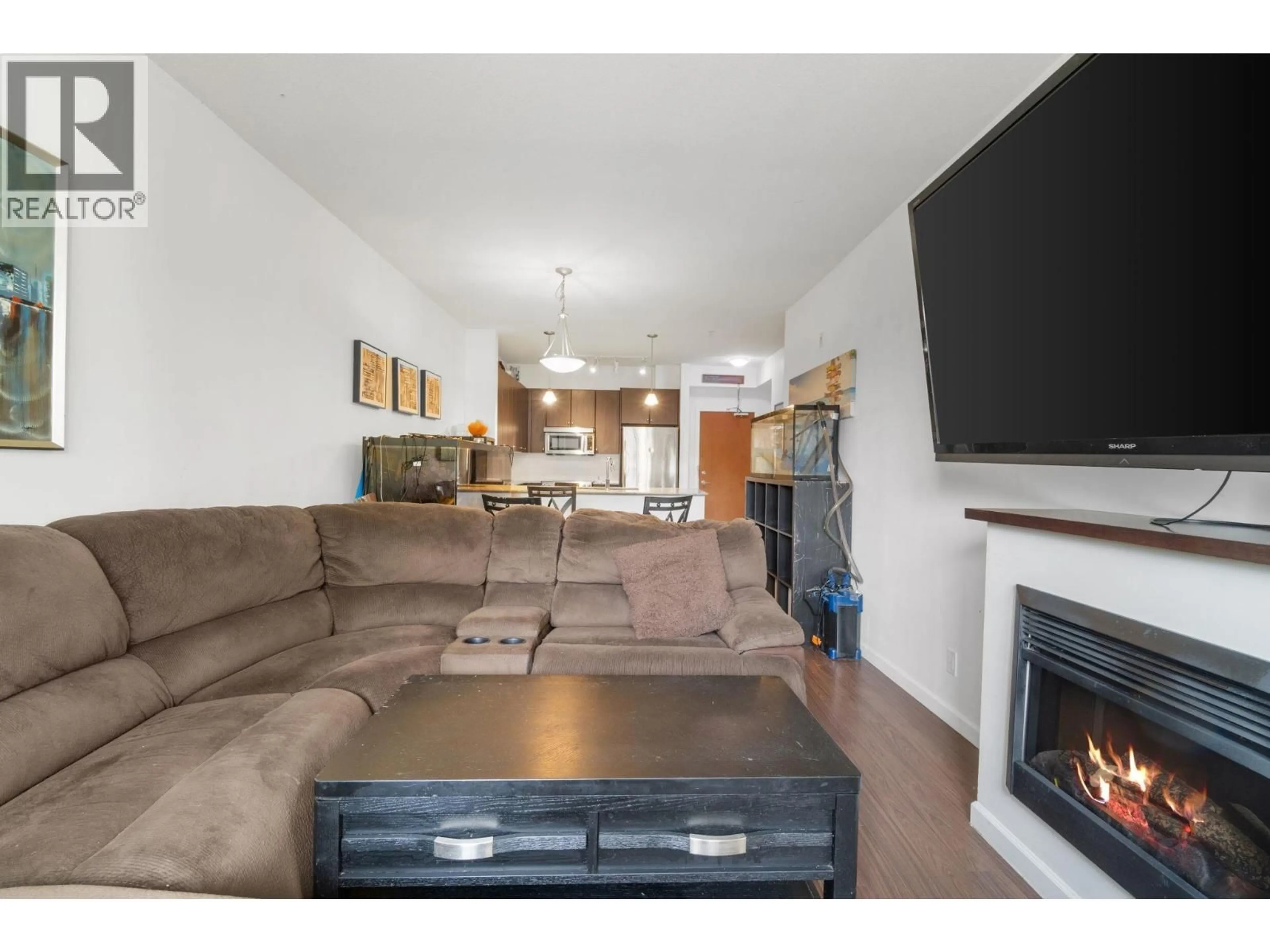 Living room with furniture, unknown for 201 - 290 FRANCIS WAY, New Westminster British Columbia V3L0C4