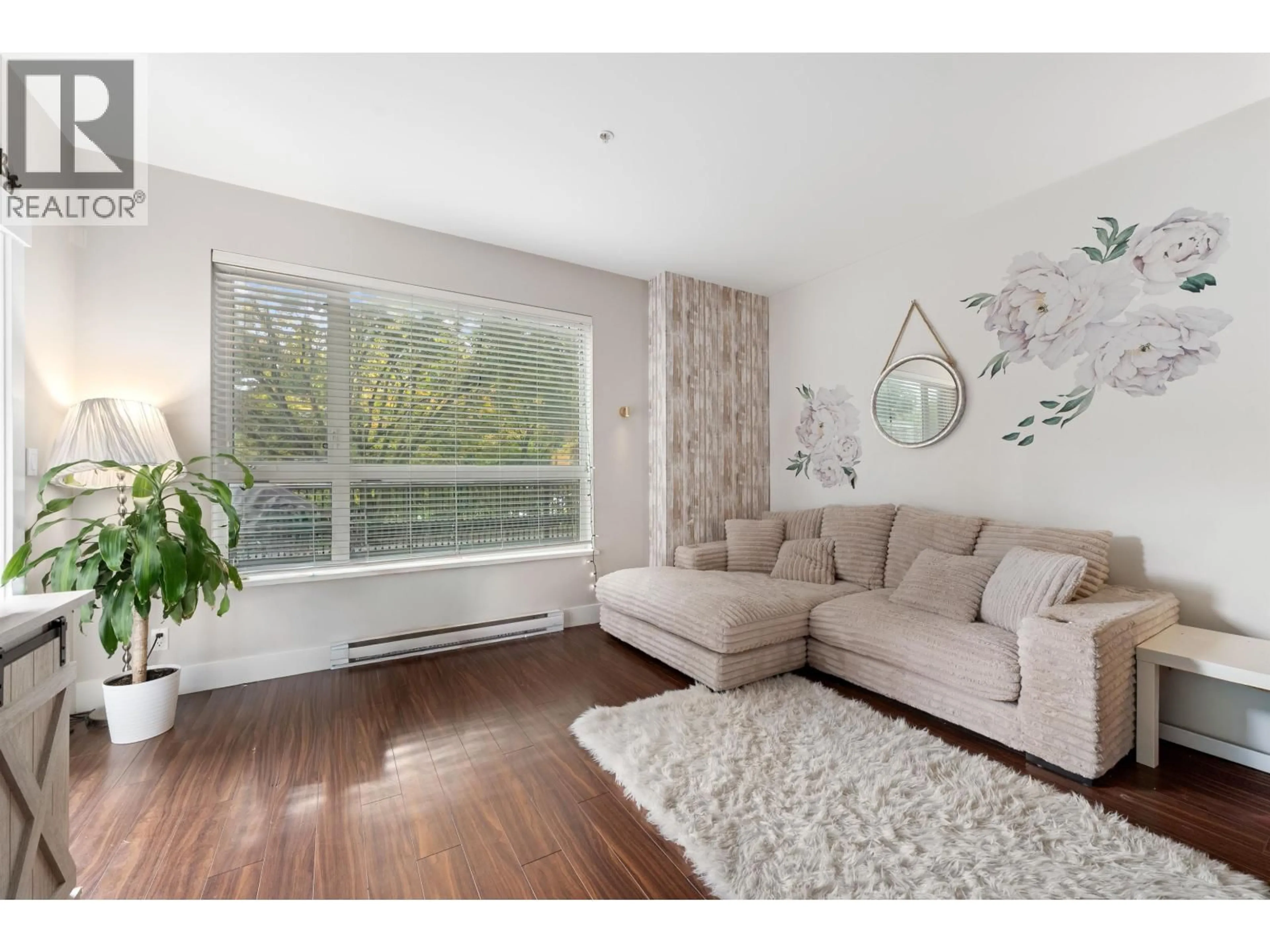 Living room with furniture, wood/laminate floor for 101 - 2351 KELLY AVENUE, Port Coquitlam British Columbia V3C0C6