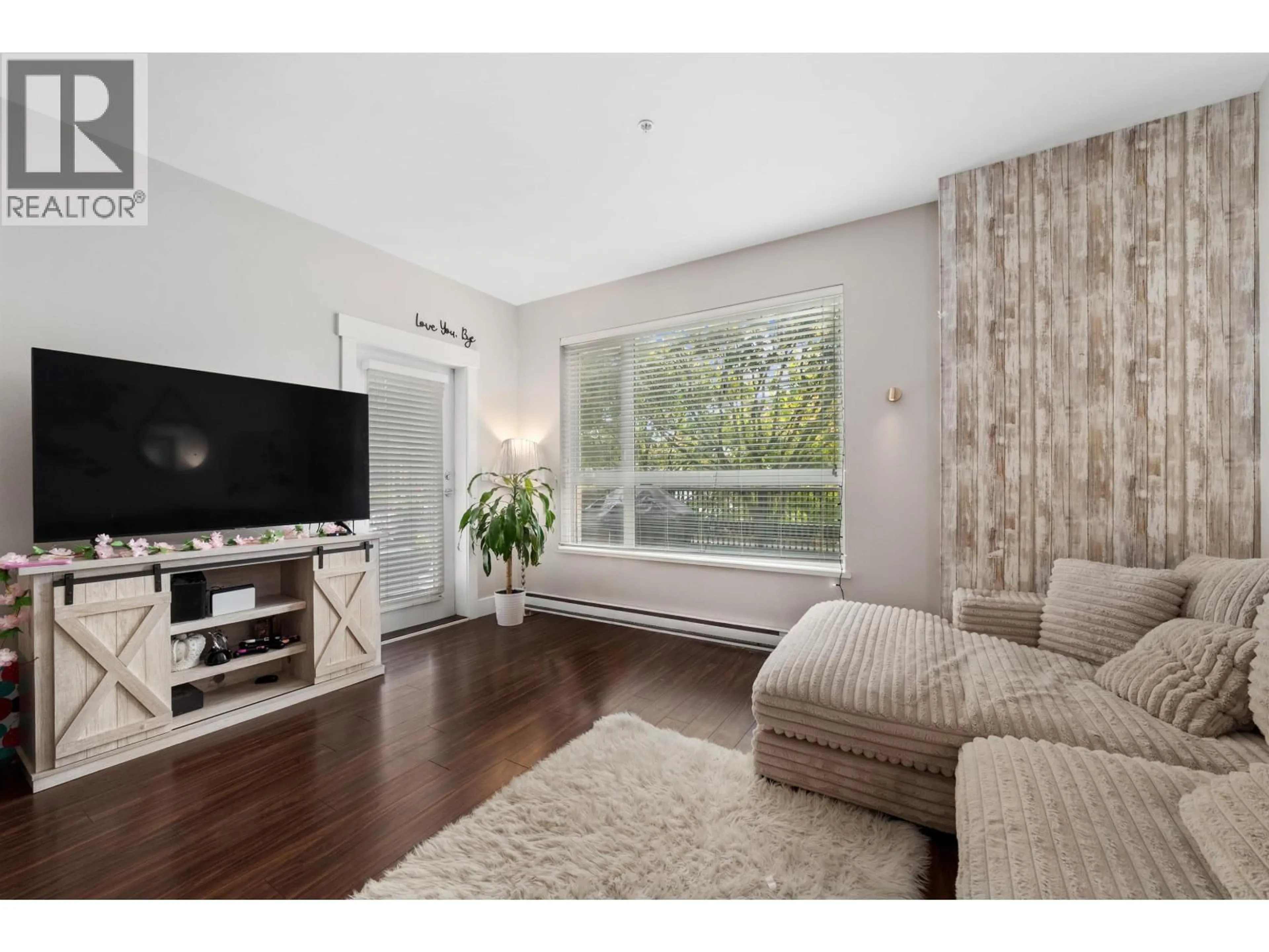 Living room with furniture, wood/laminate floor for 101 - 2351 KELLY AVENUE, Port Coquitlam British Columbia V3C0C6
