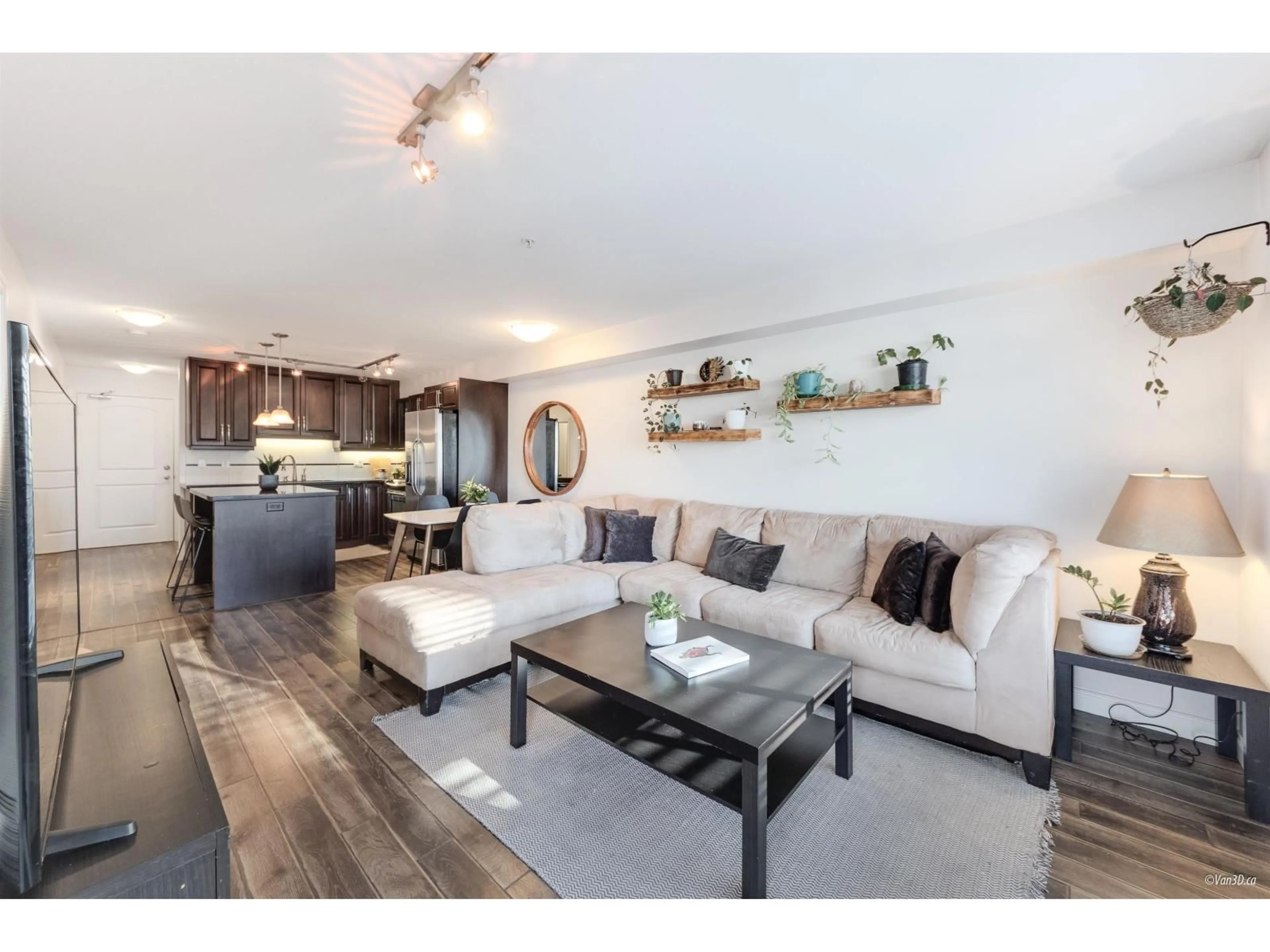 Living room with furniture, wood/laminate floor for 211 - 19939 55A, Langley British Columbia V3A3X4
