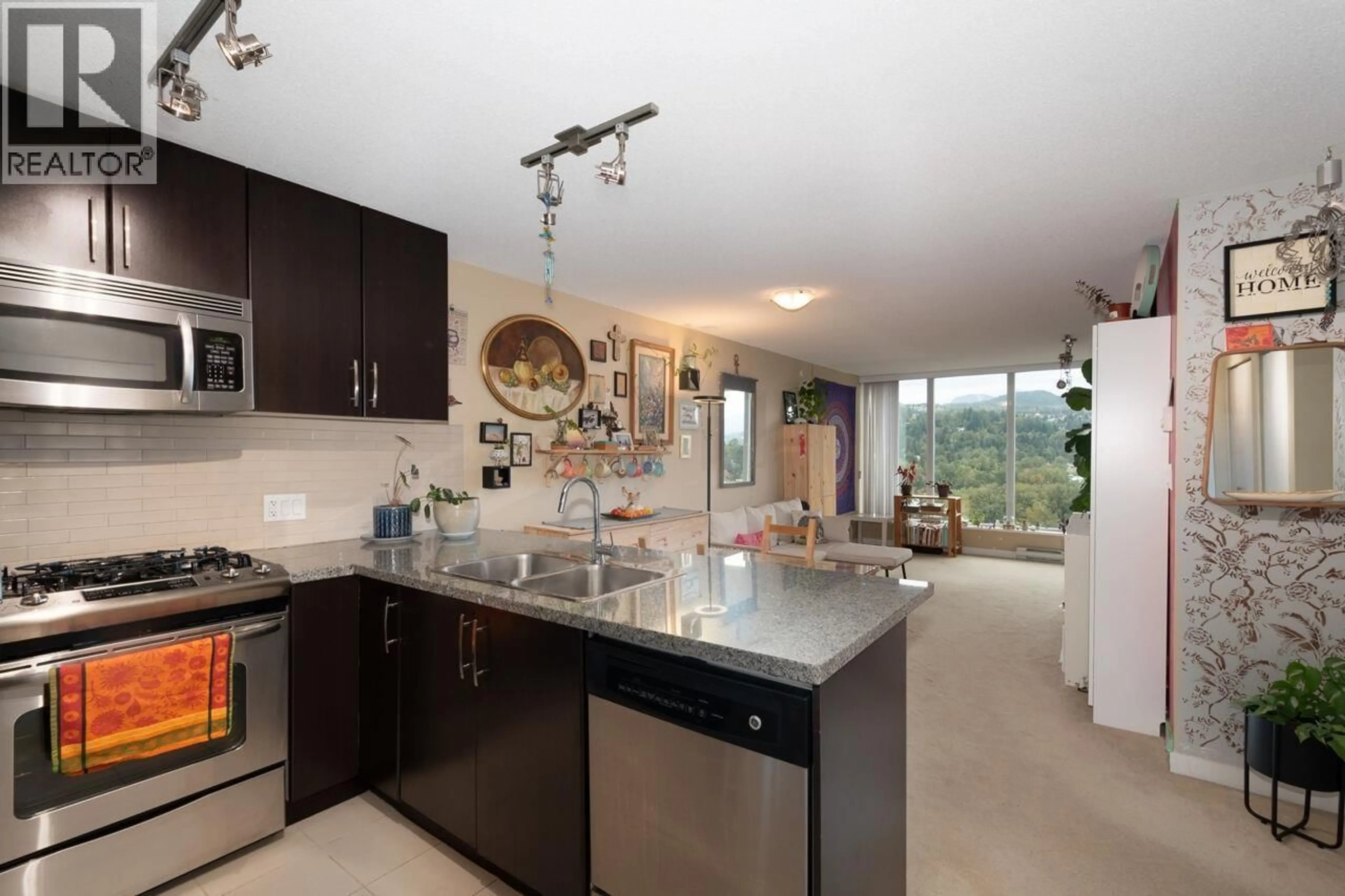 Open concept kitchen, ceramic/tile floor for 2207 - 660 NOOTKA WAY, Port Moody British Columbia V3H0B7