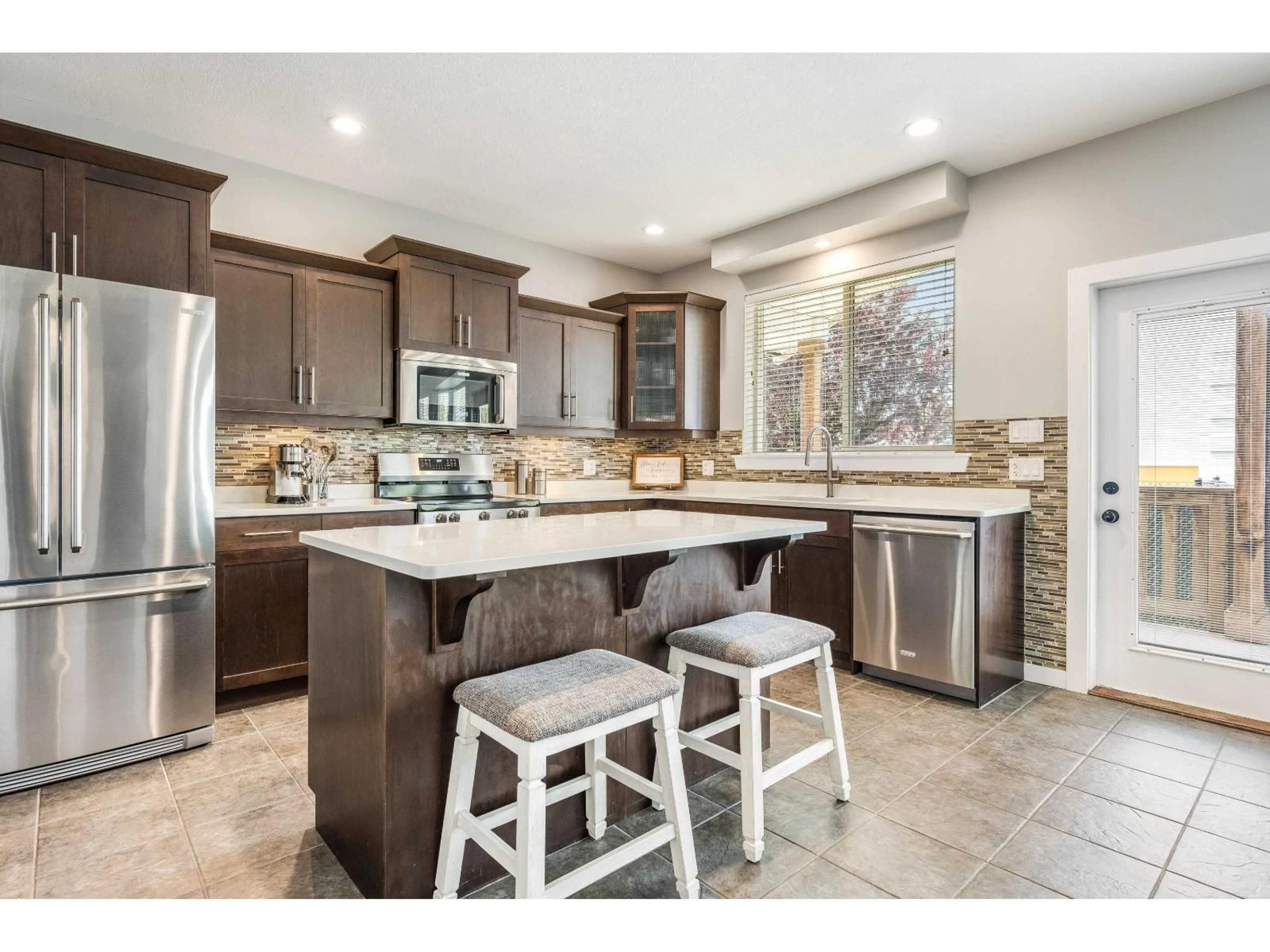 Open concept kitchen, ceramic/tile floor for 10011 KILLARNEY DRIVE, Chilliwack British Columbia V2P5P7