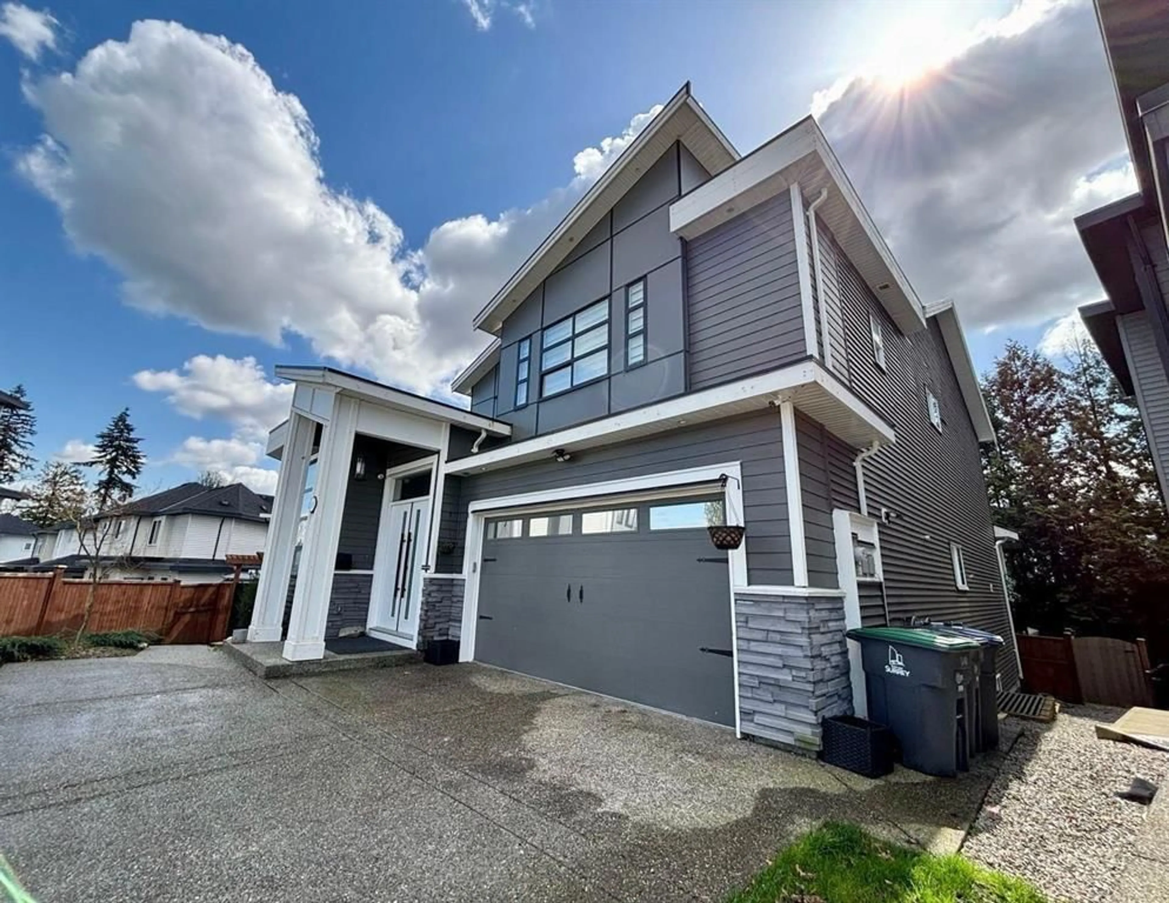 Home with vinyl exterior material, street for 16488 103, Surrey British Columbia V4N1Y6