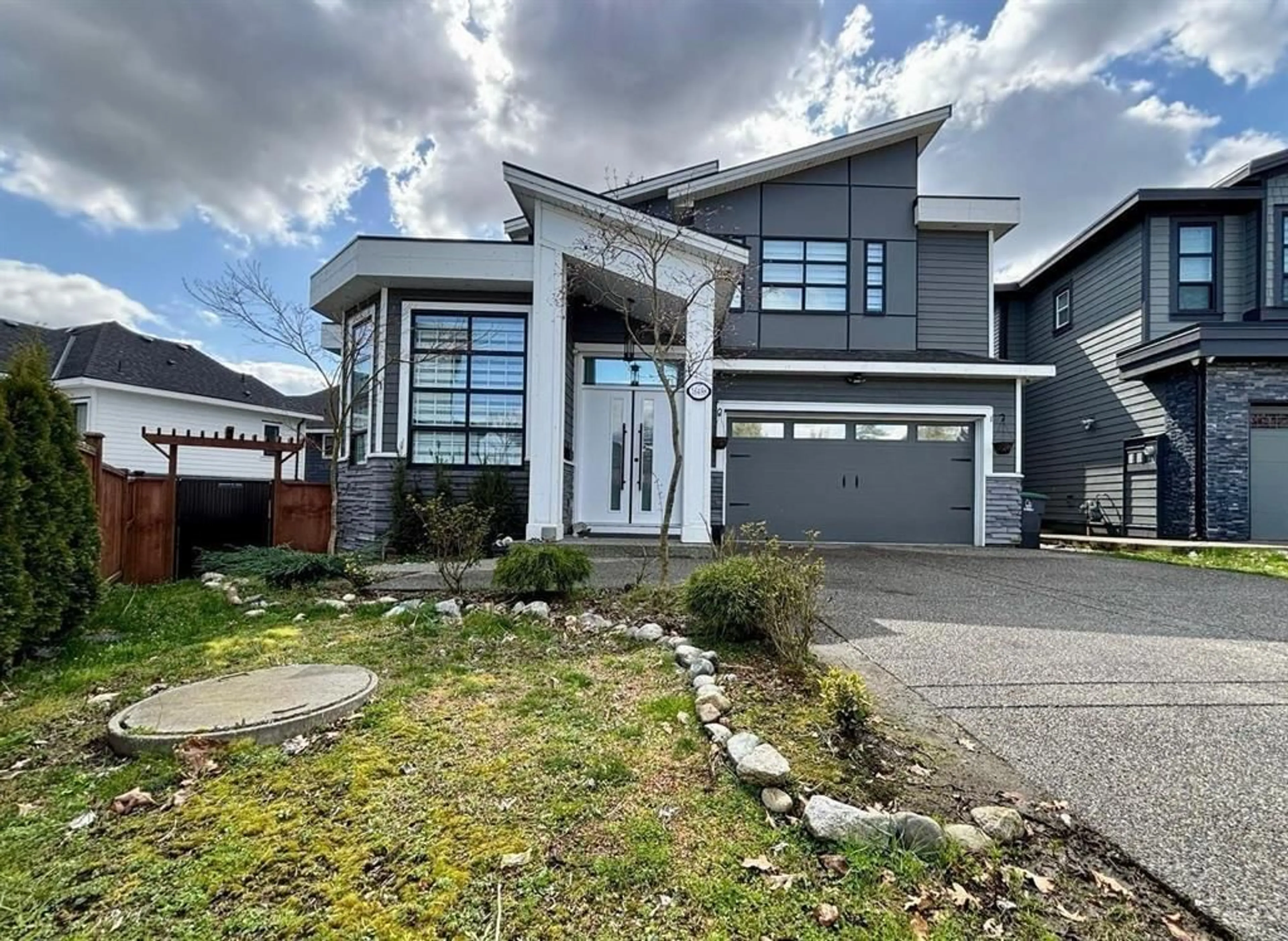 Home with vinyl exterior material, street for 16488 103, Surrey British Columbia V4N1Y6