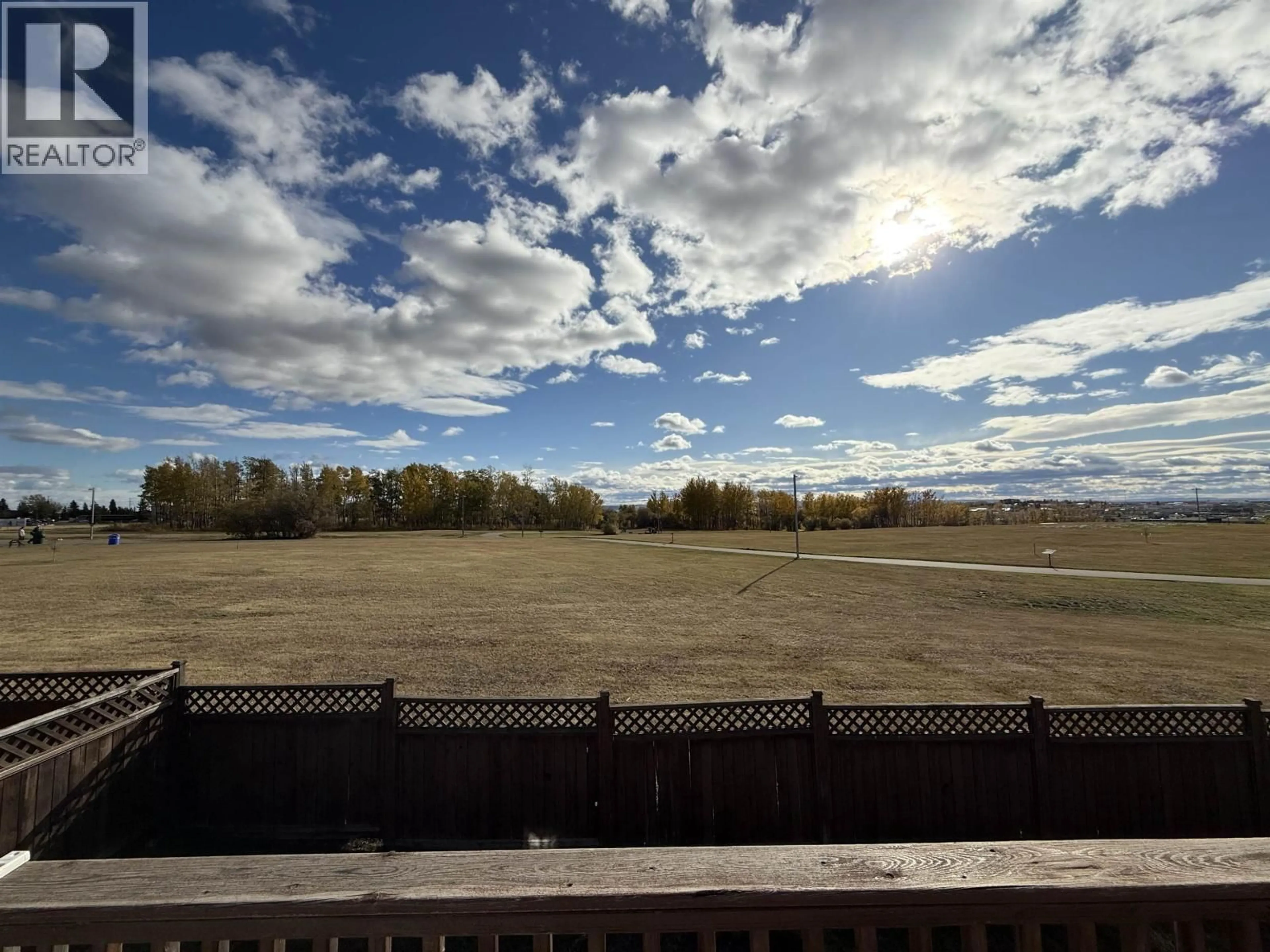 A pic from outside/outdoor area/front of a property/back of a property/a pic from drone, unknown for 8819 96A AVENUE, Fort St. John British Columbia V1J0A3