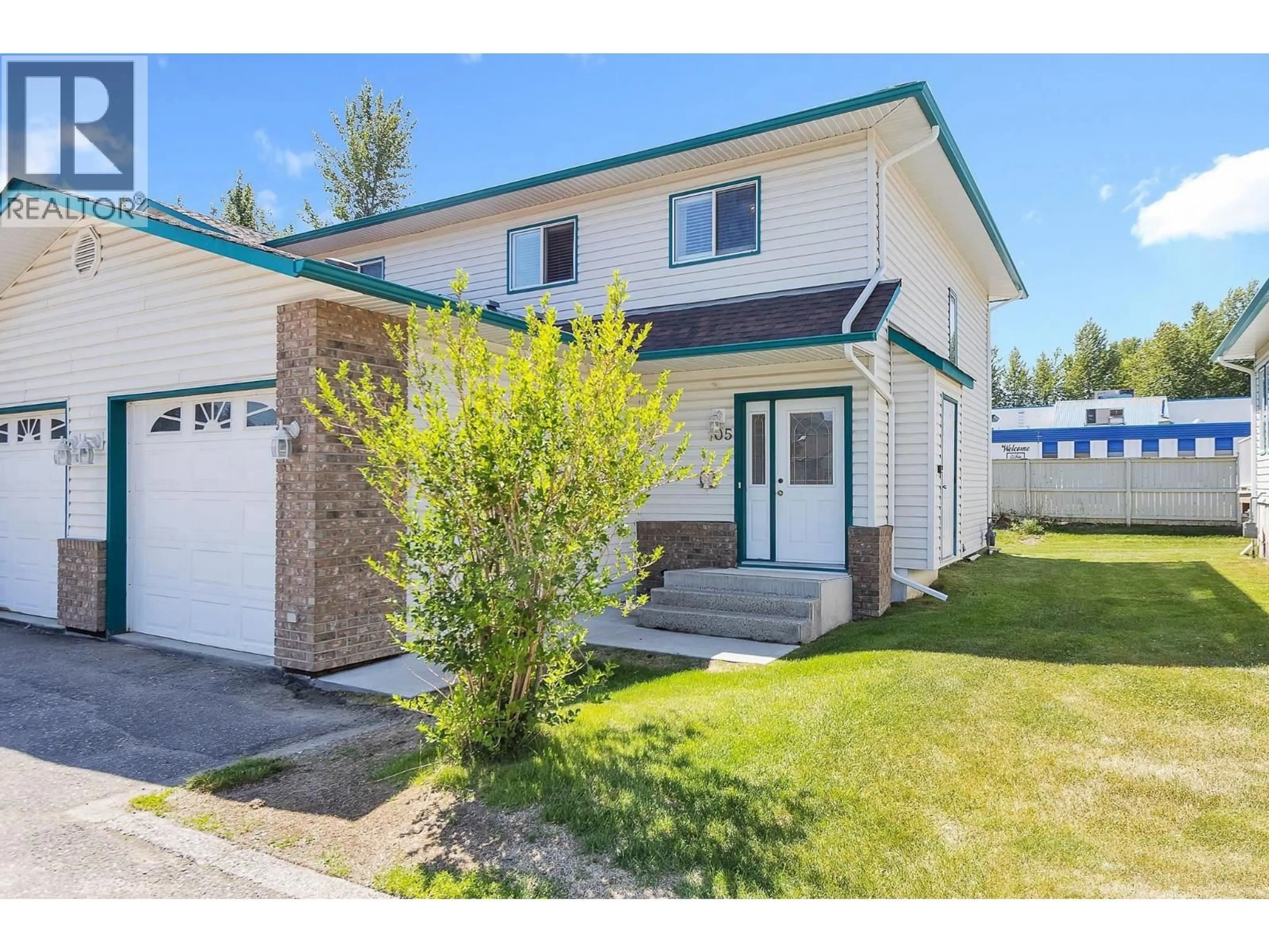 Home with vinyl exterior material, street for 105 - 7180 ST LAWRENCE AVENUE, Prince George British Columbia V2N5C6