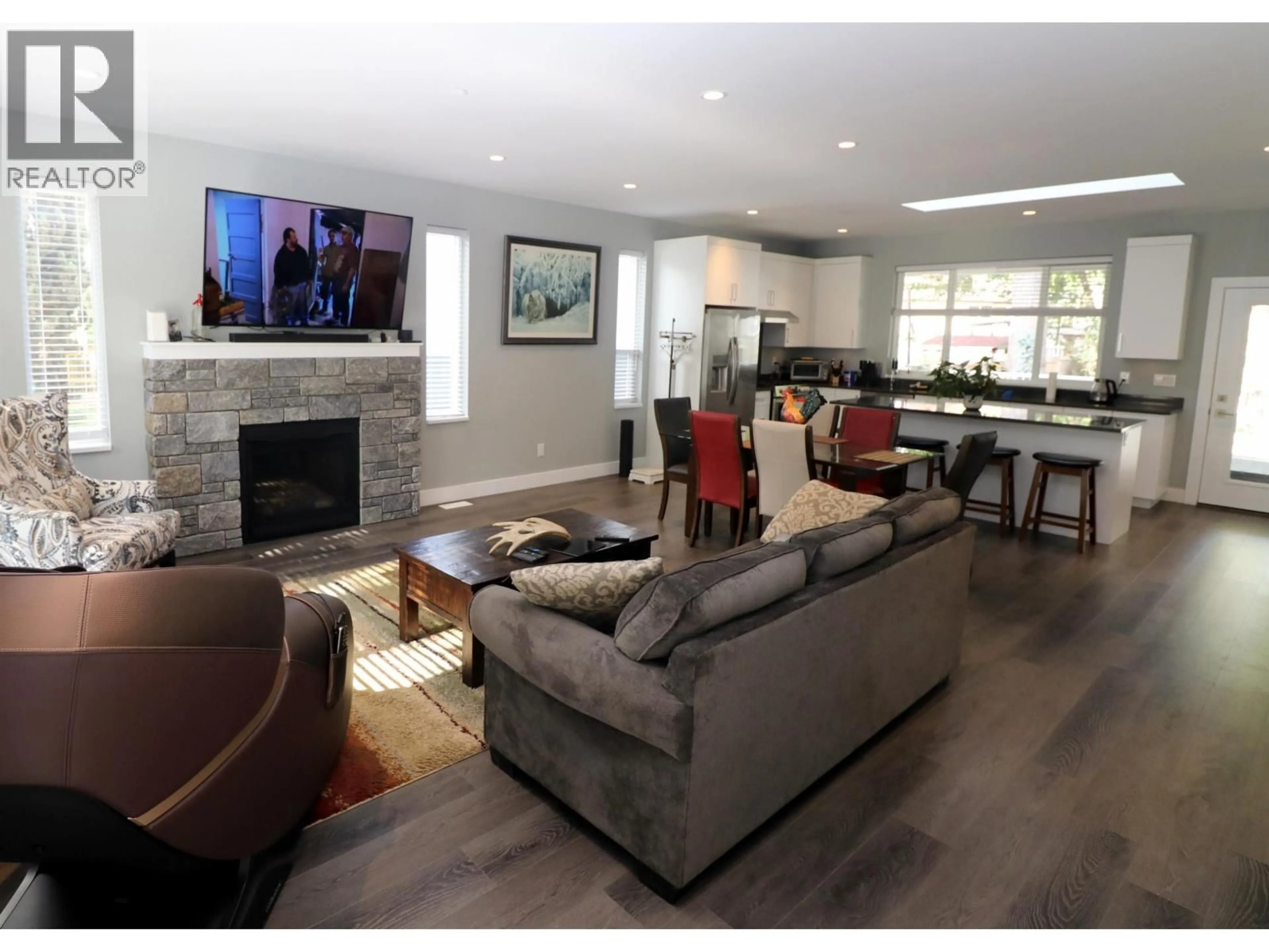 Living room with furniture, wood/laminate floor for 2705 DAVIES AVENUE, Port Coquitlam British Columbia V3C2K1