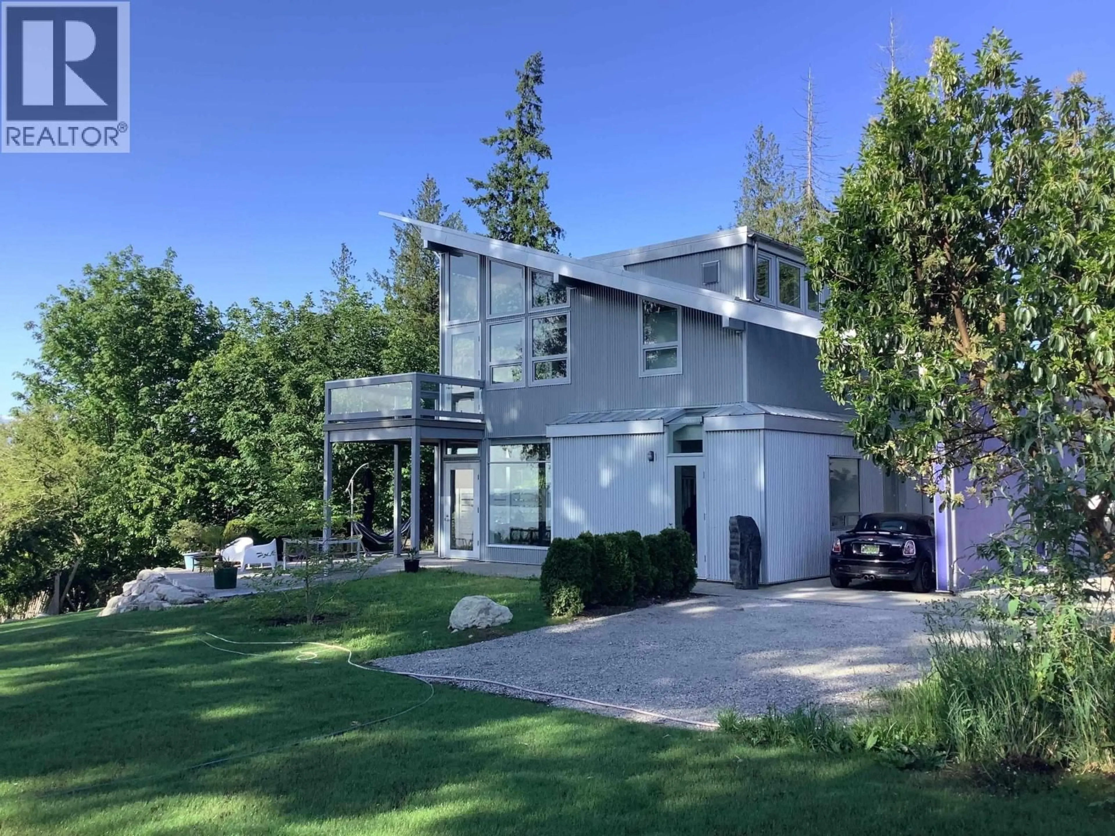 Home with vinyl exterior material, street for 5550 NICKERSON ROAD, Sechelt British Columbia V7Z0M4