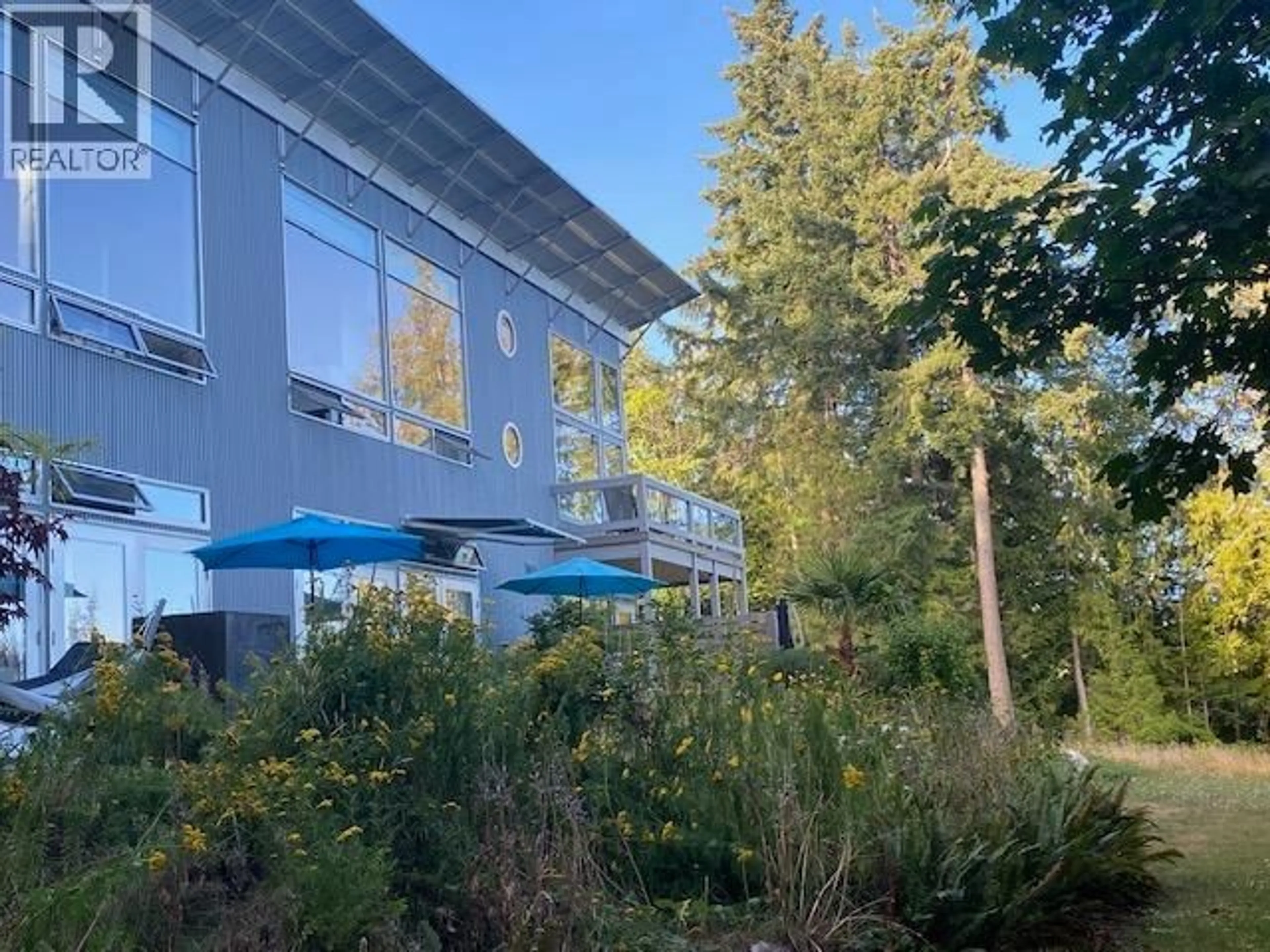 A pic from outside/outdoor area/front of a property/back of a property/a pic from drone, unknown for 5550 NICKERSON ROAD, Sechelt British Columbia V7Z0M4