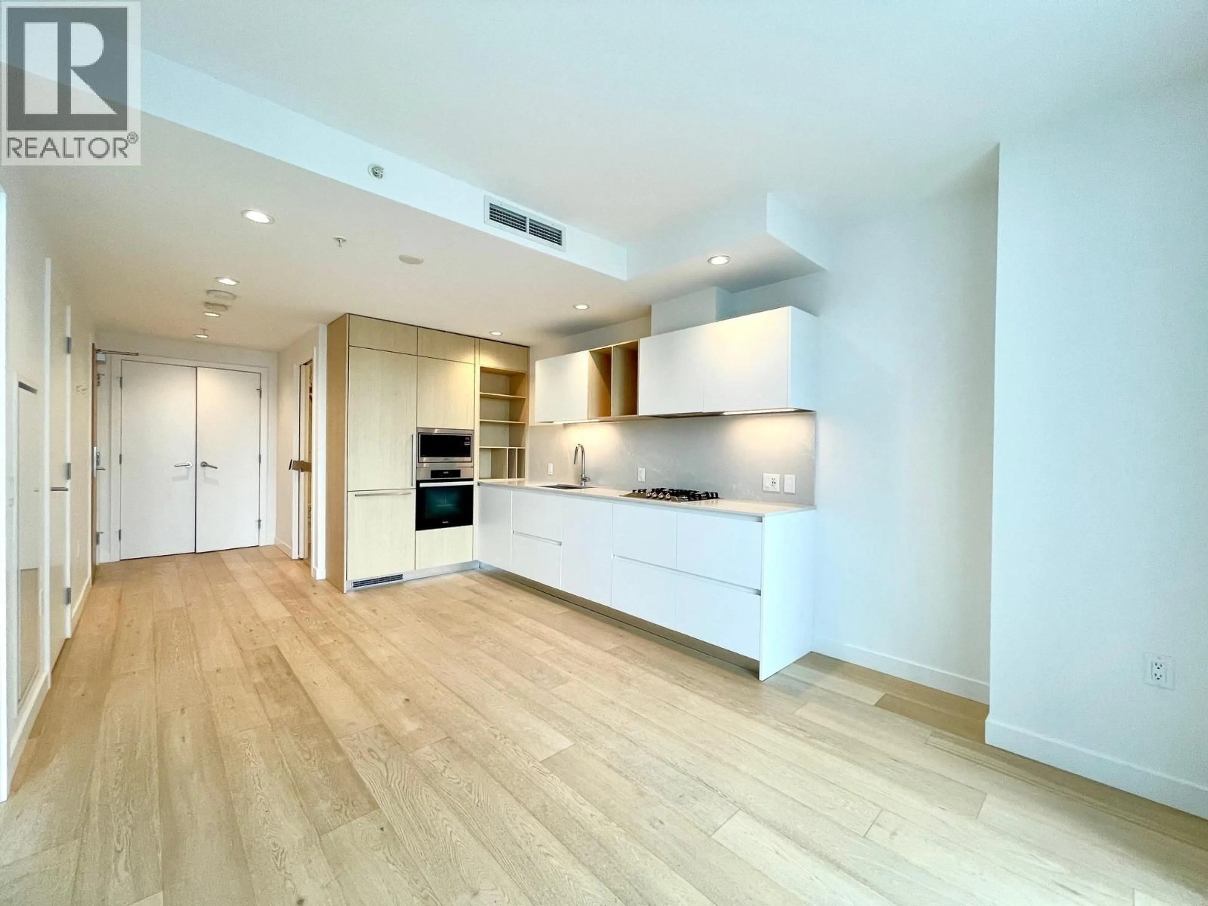 Open concept kitchen, wood/laminate floor for 1901 - 6000 MCKAY AVENUE, Burnaby British Columbia V5H0K2