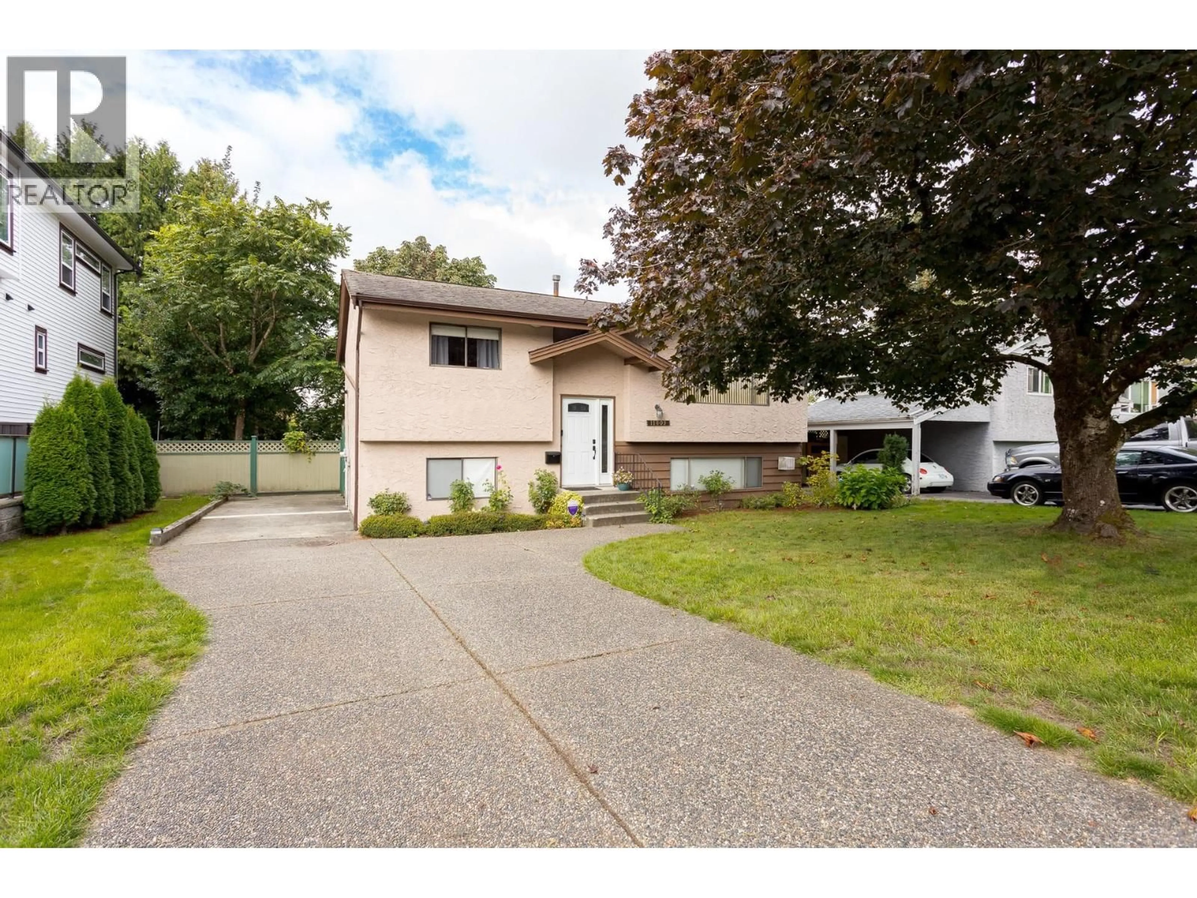Home with vinyl exterior material, street for 11809 230 STREET, Maple Ridge British Columbia V2X6R3
