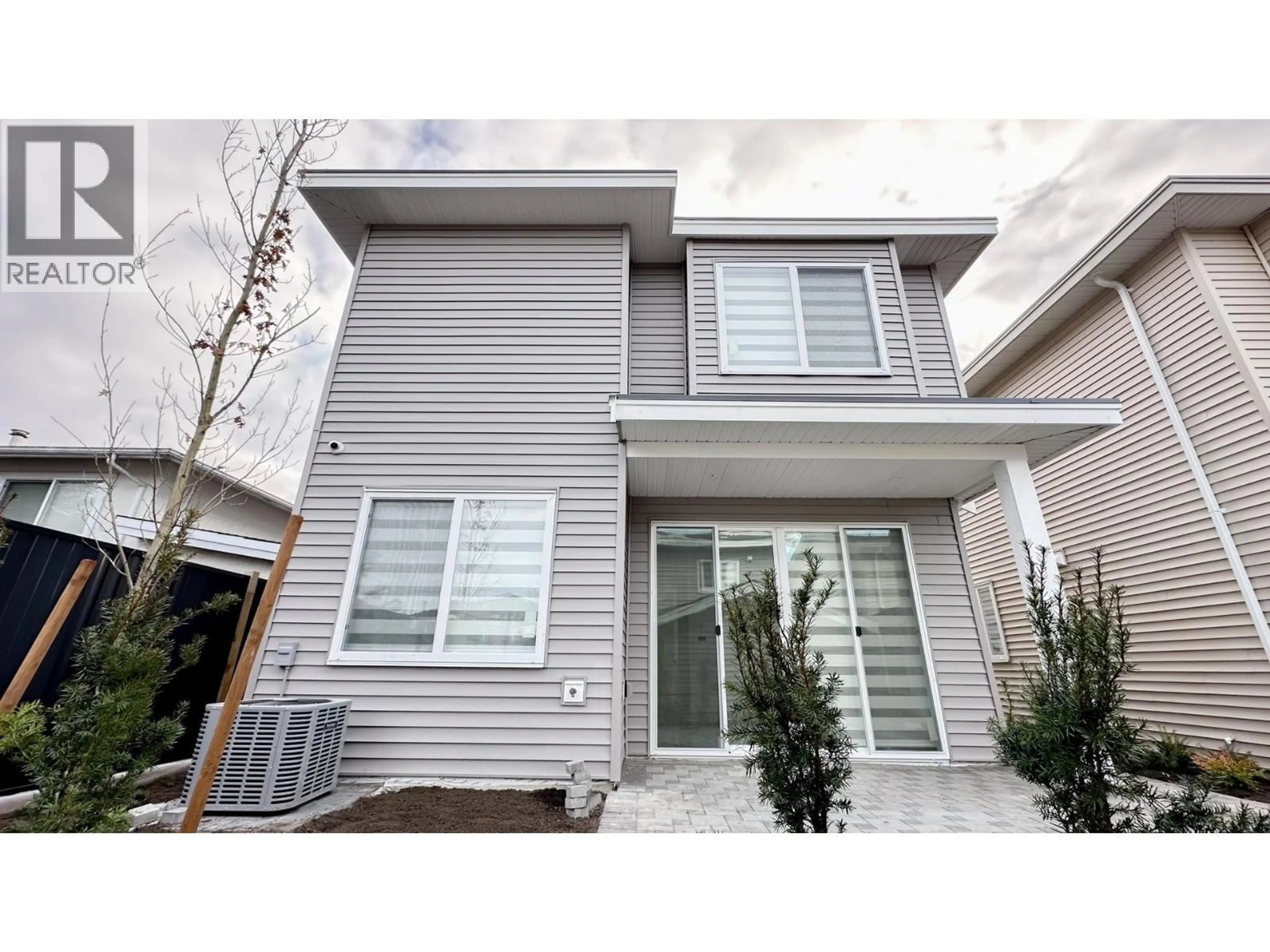 Home with vinyl exterior material, street for 10655 NO. 1 ROAD, Richmond British Columbia V7E2E8