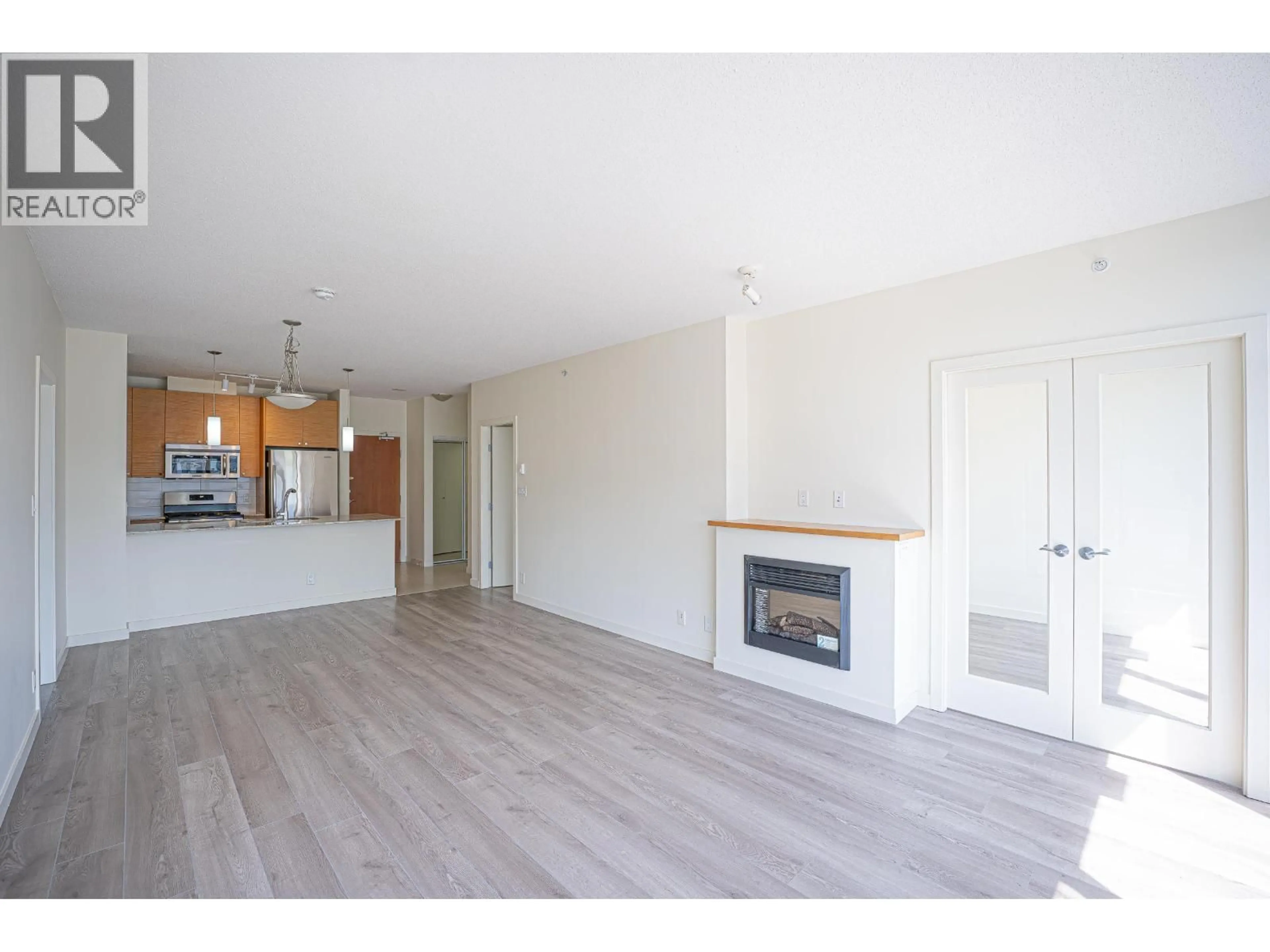 Open concept kitchen, wood/laminate floor for 1103 - 110 BREW STREET, Port Moody British Columbia V3H0E4