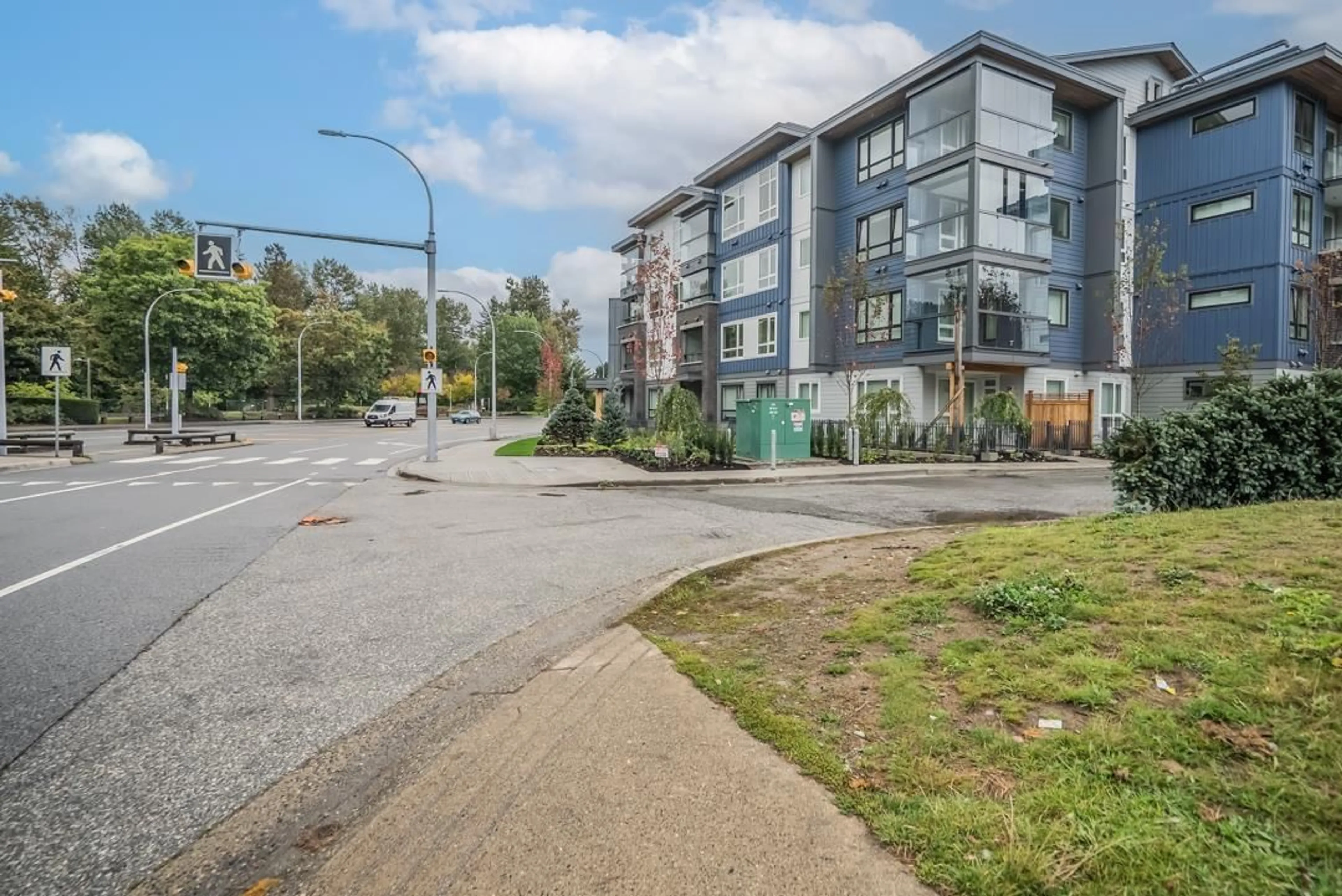 A pic from outside/outdoor area/front of a property/back of a property/a pic from drone, street for 406 - 13788 76, Surrey British Columbia V3W3V9