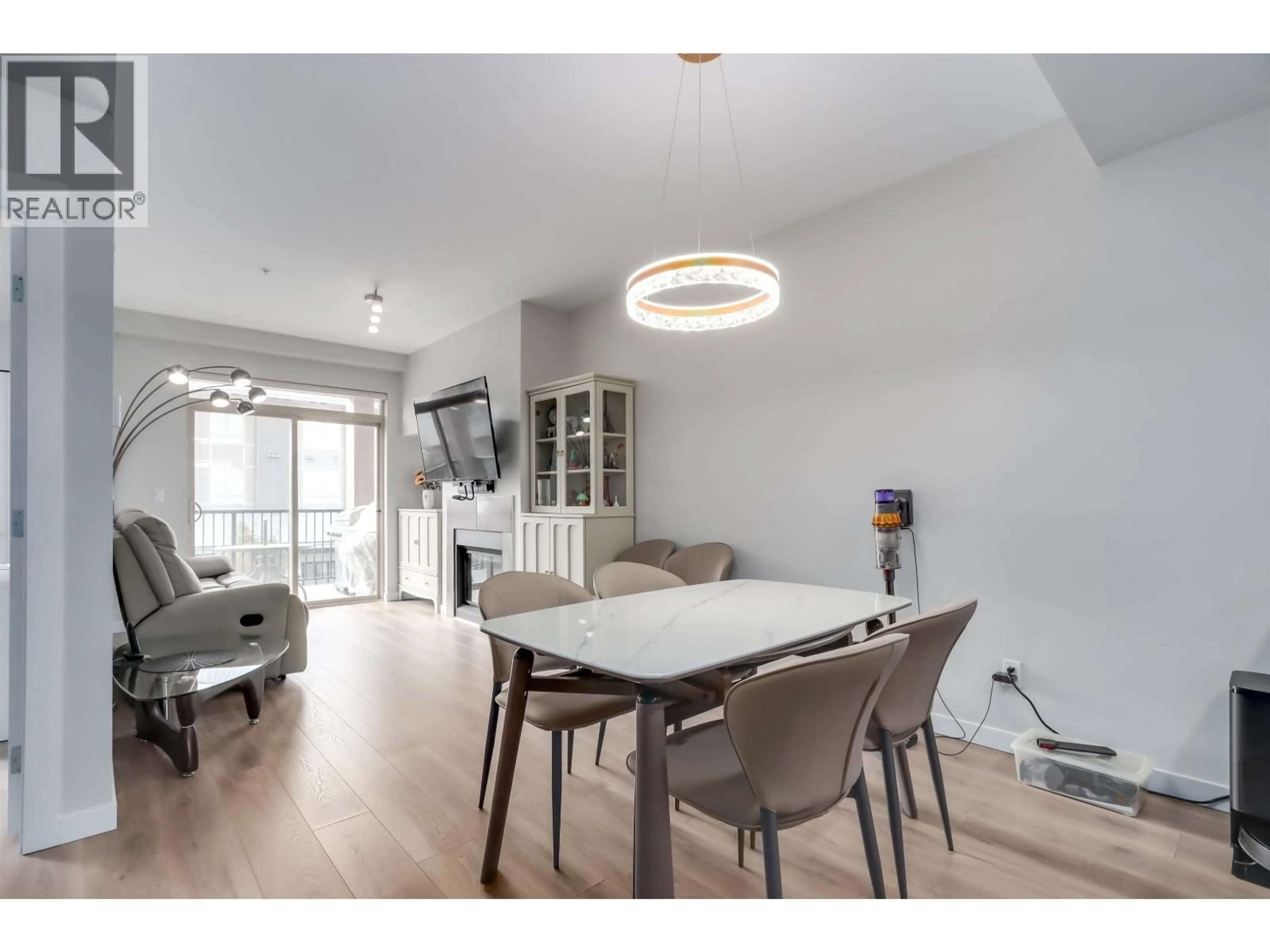 Dining room, wood/laminate floor for 204 - 6077 LONDON ROAD, Richmond British Columbia V6E0A7